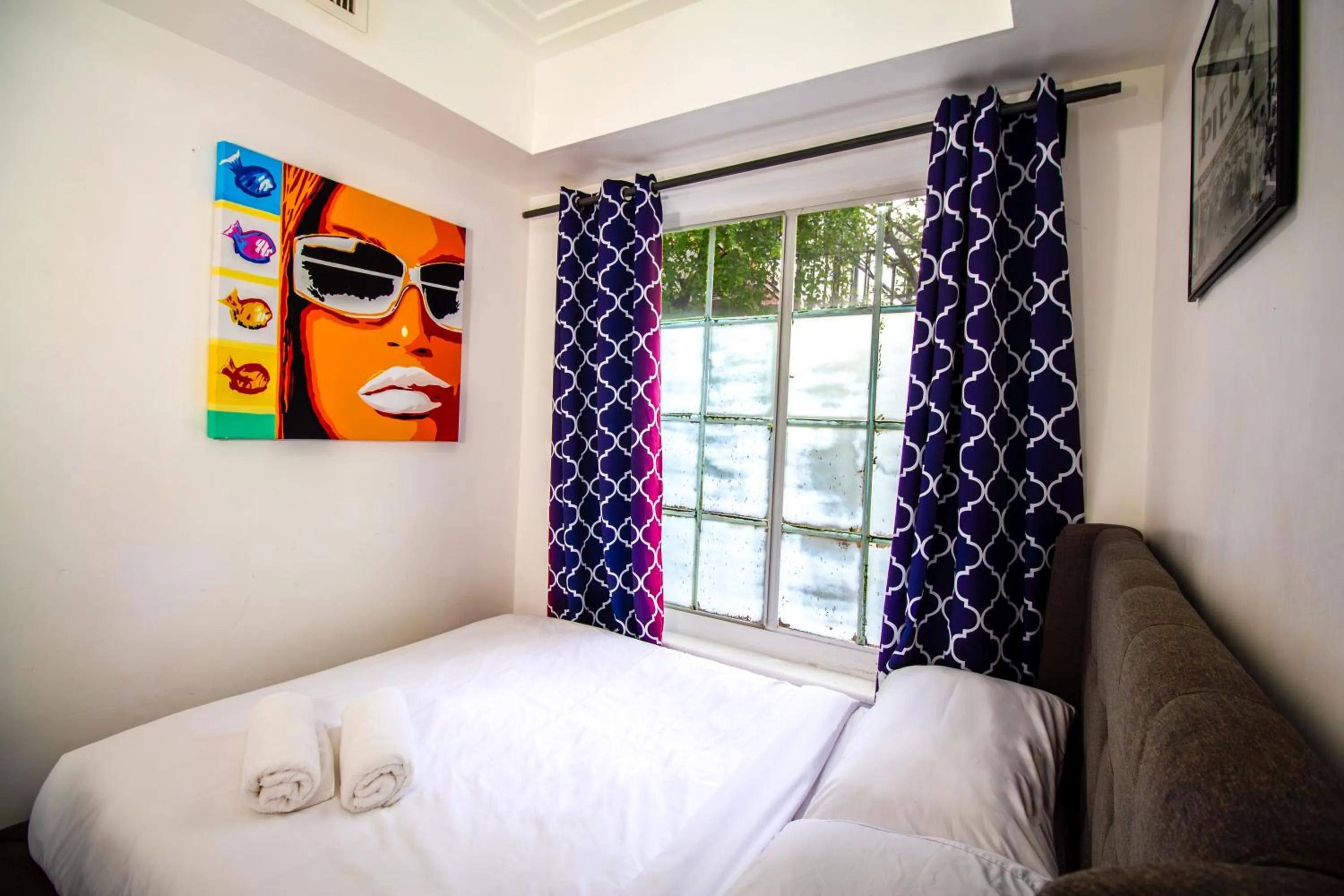 Bed in Courtyard Apartments Part of the Oasis Casita Collection