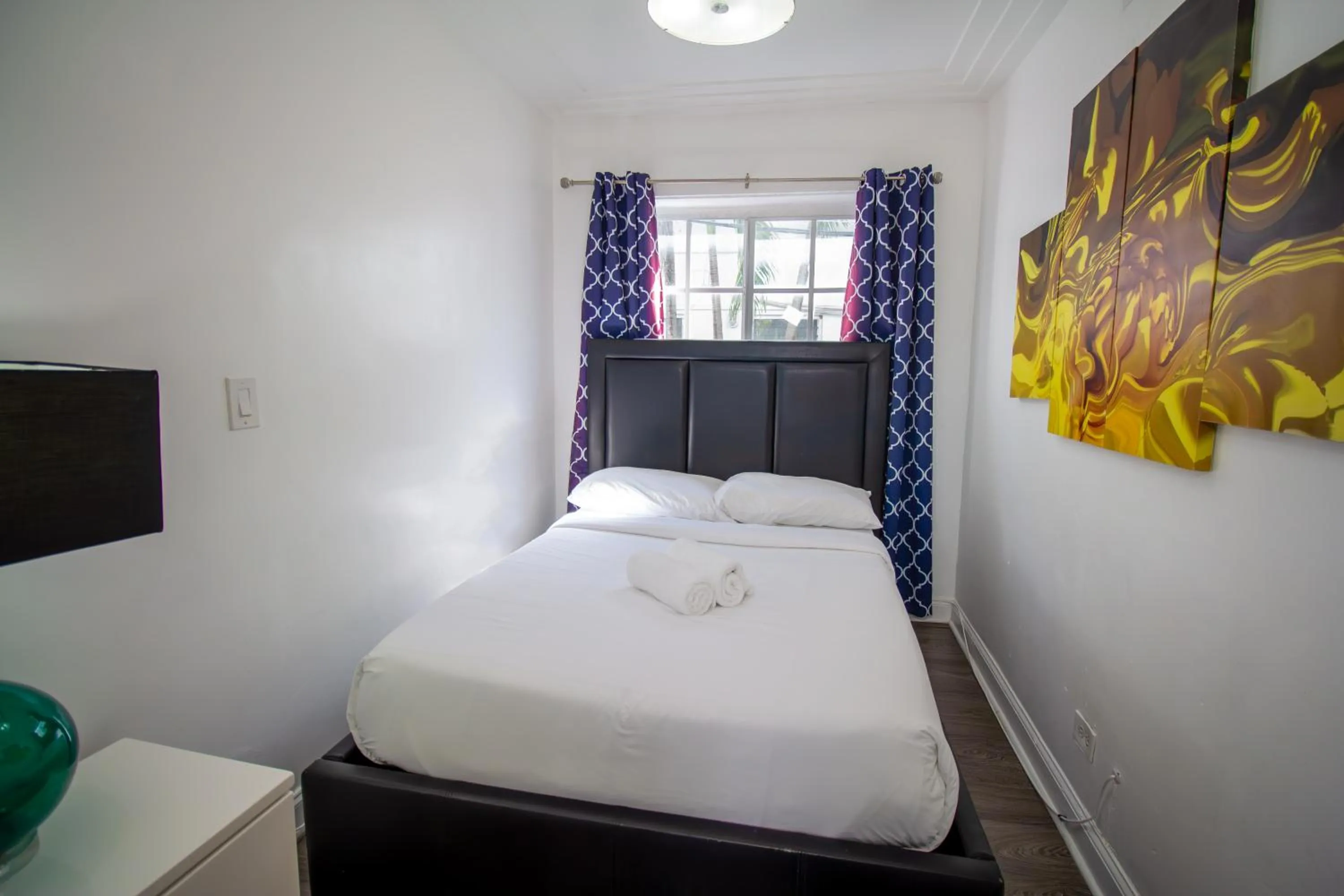 Bed in Courtyard Apartments Part of the Oasis Casita Collection