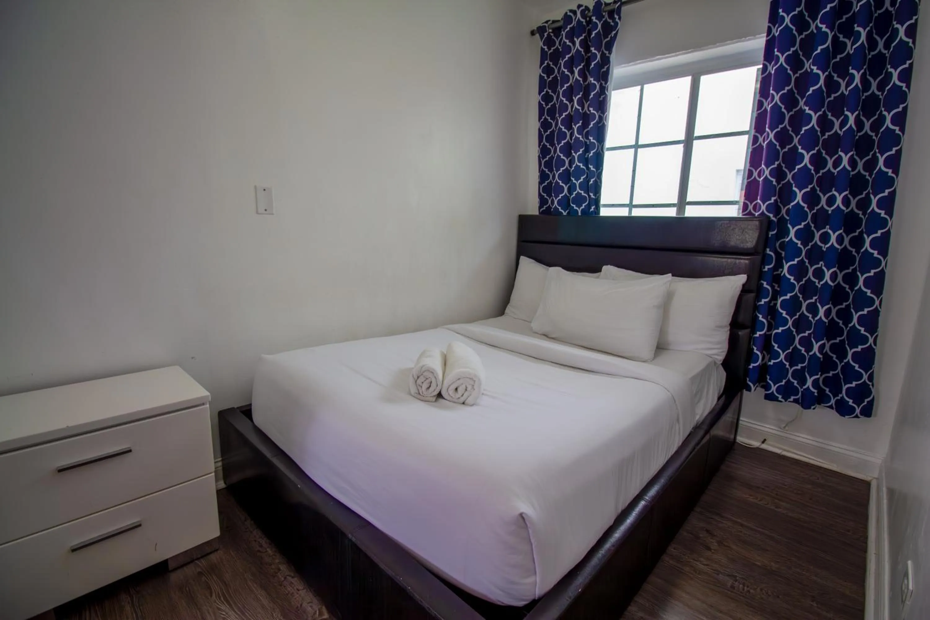 Bed in Courtyard Apartments Part of the Oasis Casita Collection