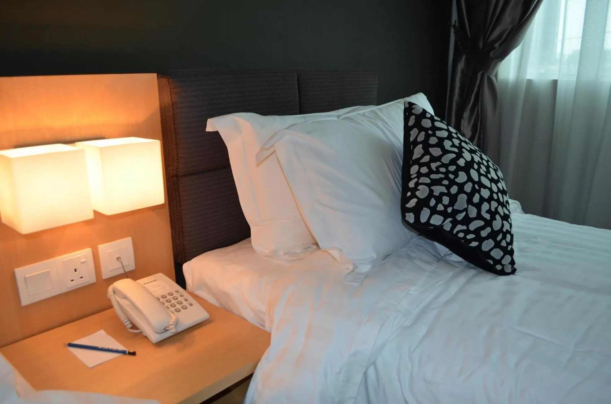 Bed in Q Bintang Hotel