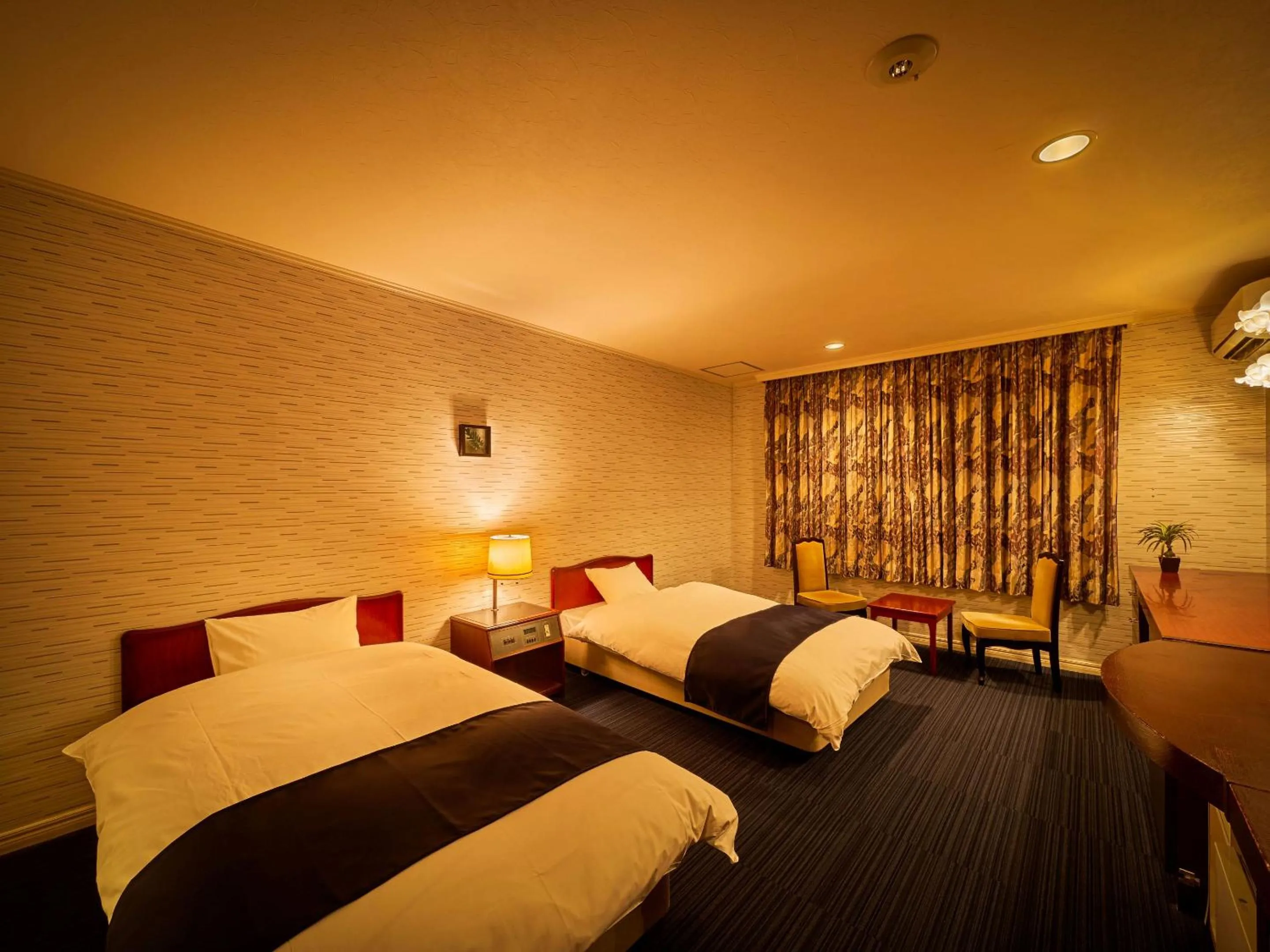 Photo of the whole room, Bed in Yukai Resort Dogo Saichoraku
