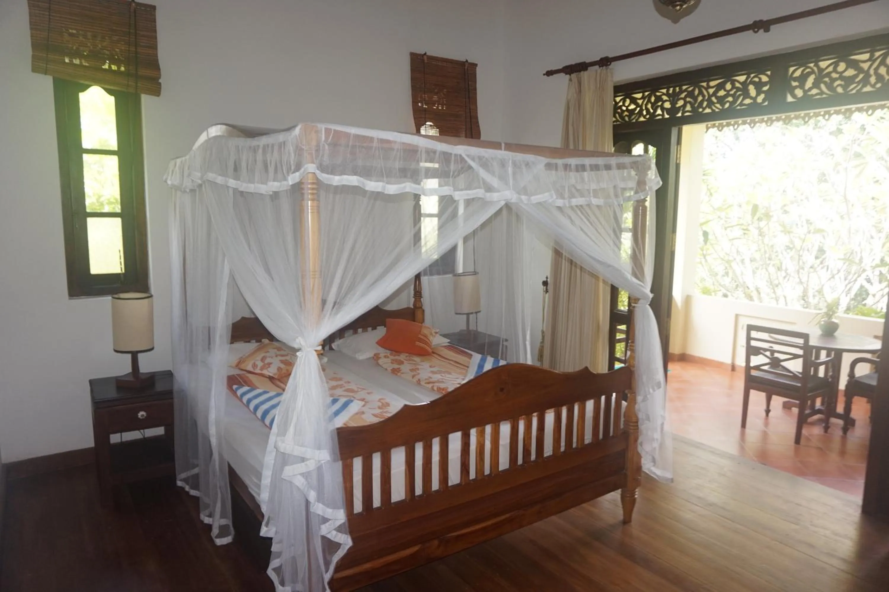 Photo of the whole room, Bed in Lanka Beach Bungalows
