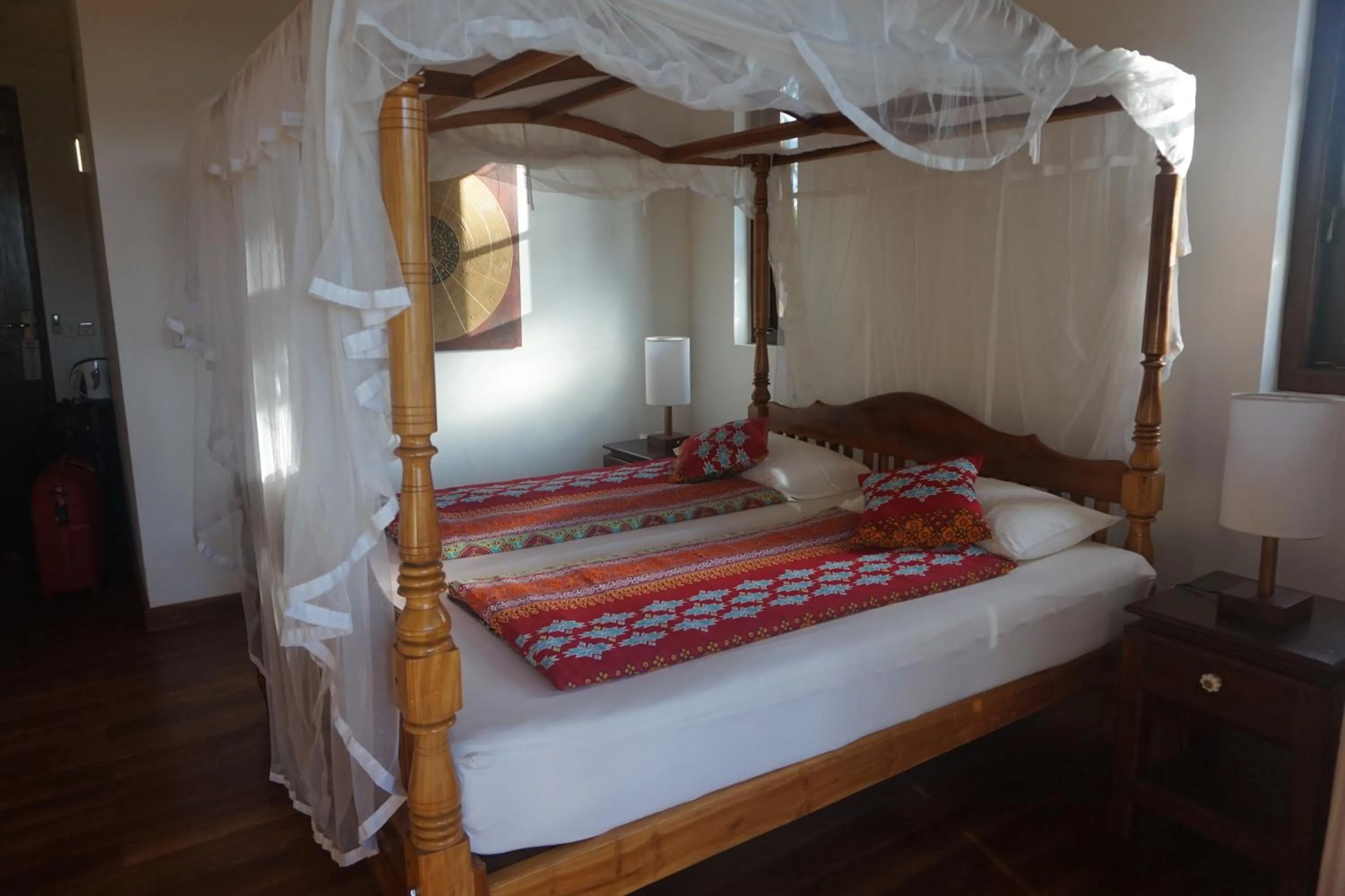 Bed in Lanka Beach Bungalows