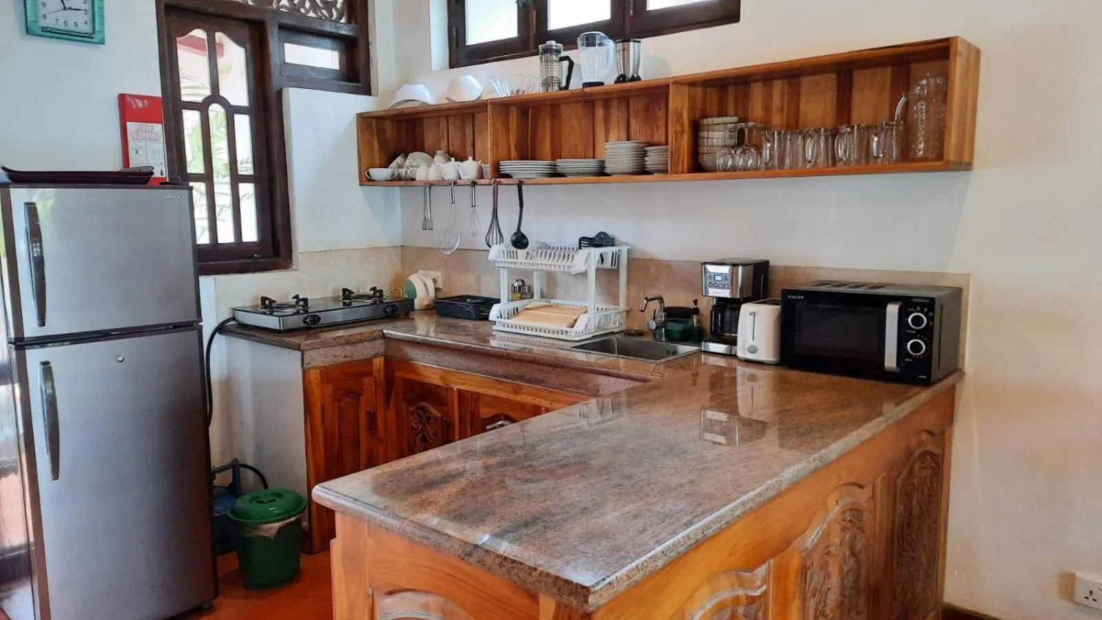 Kitchen or kitchenette in Lanka Beach Boutique Bungalows & Grand Villa