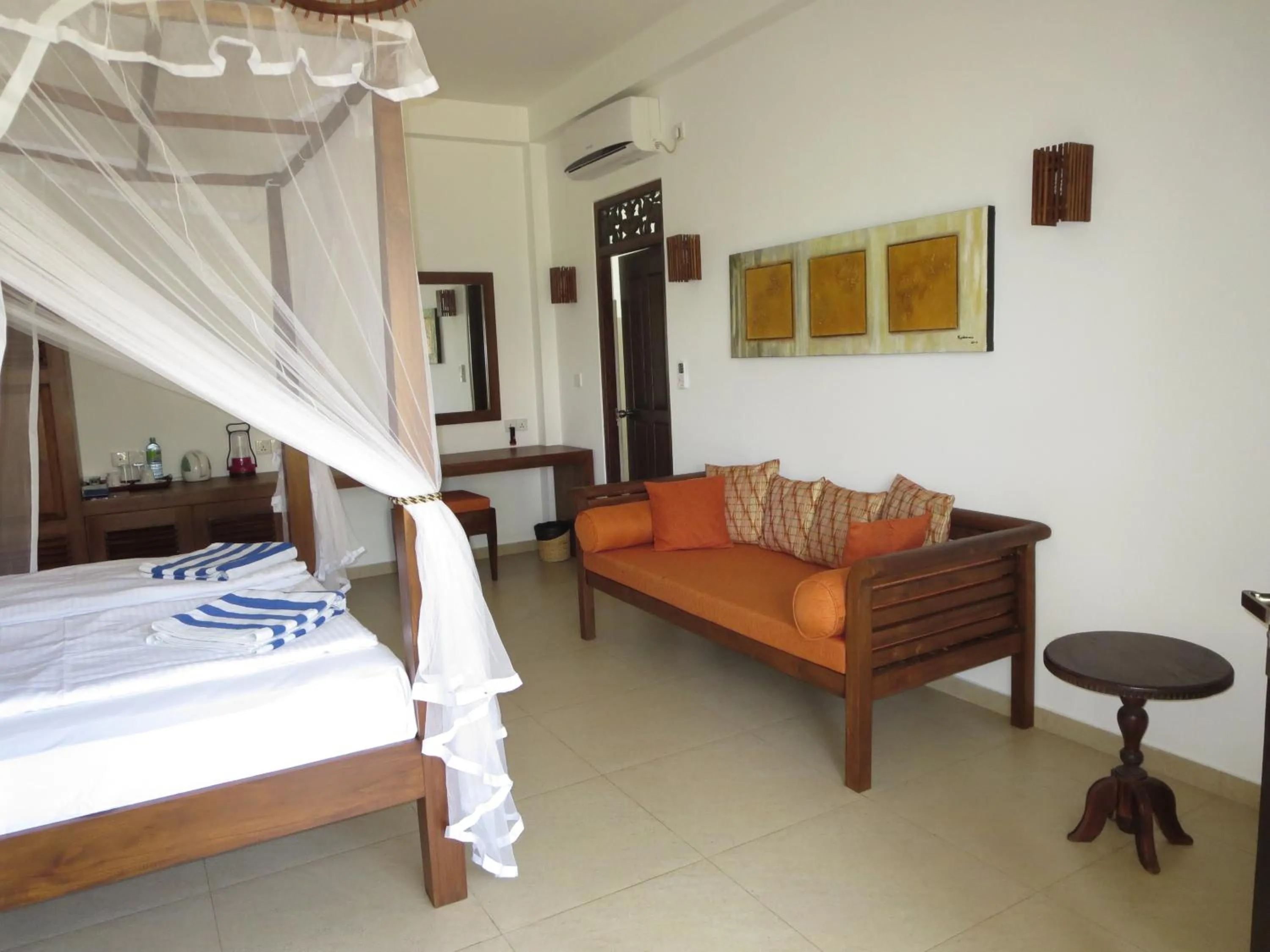 Bedroom in Lanka Beach Bungalows