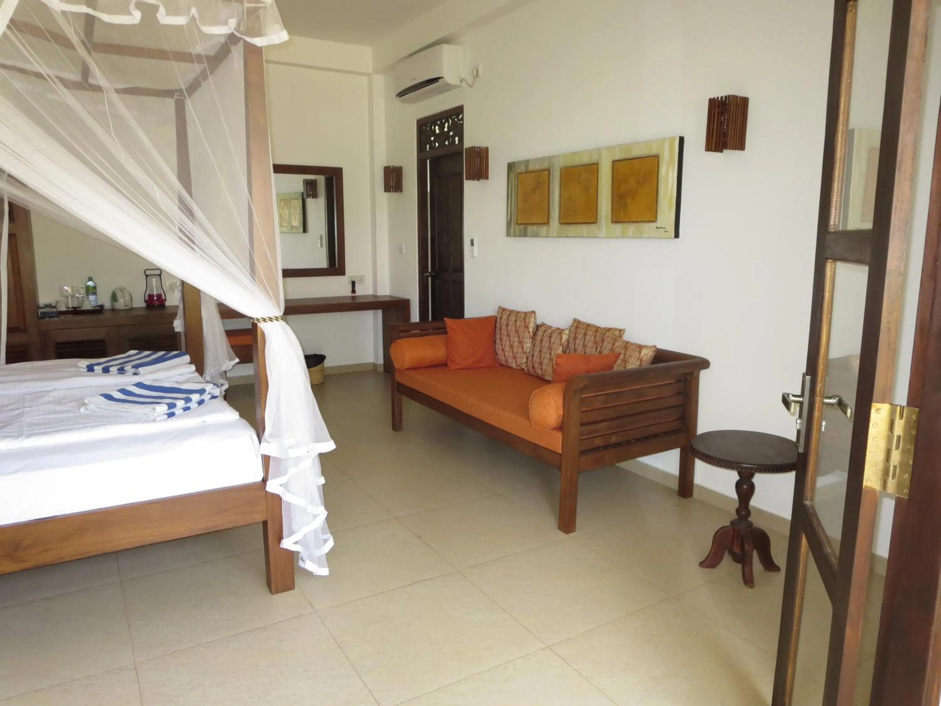 Bed in Lanka Beach Bungalows
