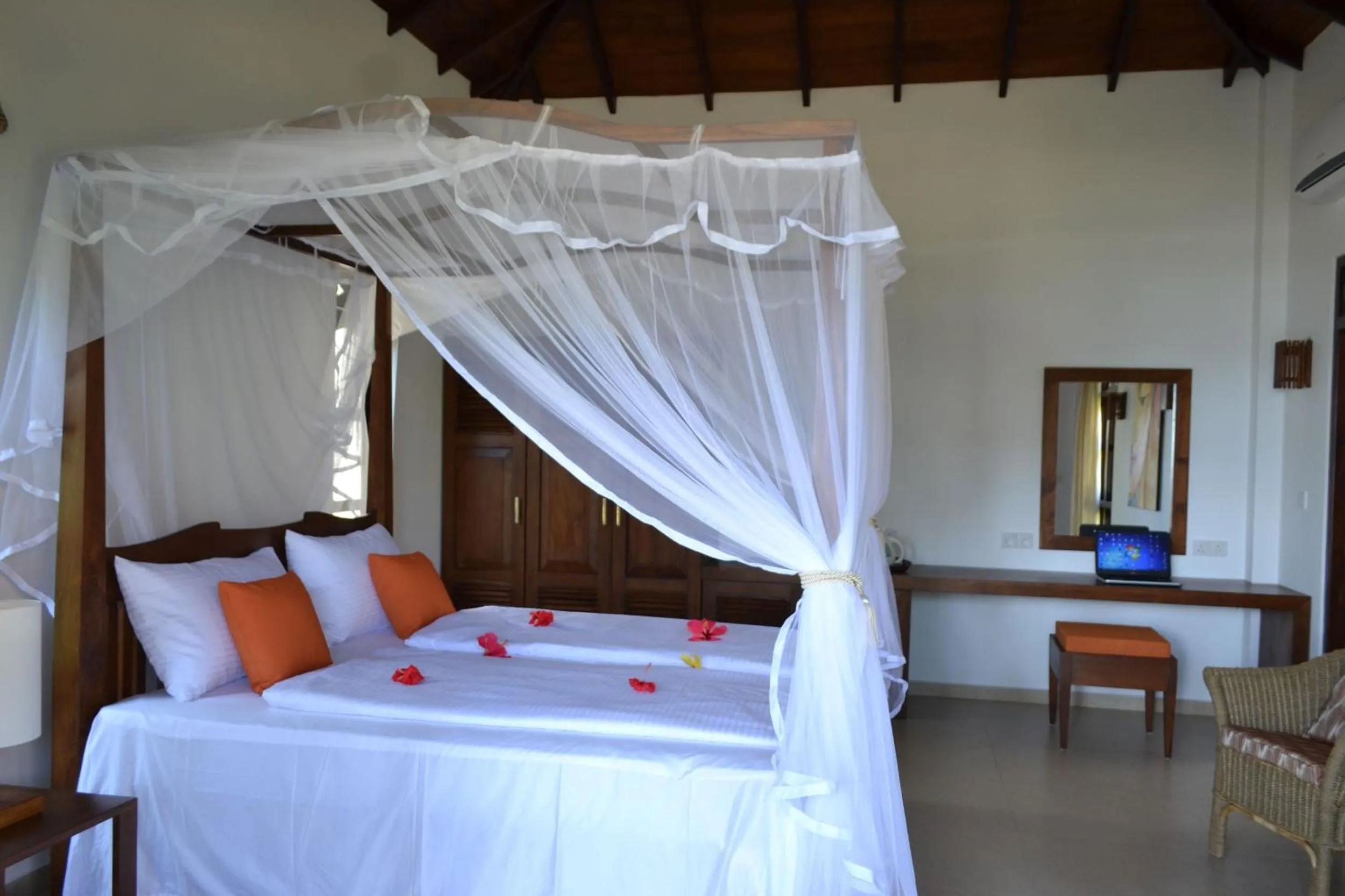 Bed in Lanka Beach Bungalows