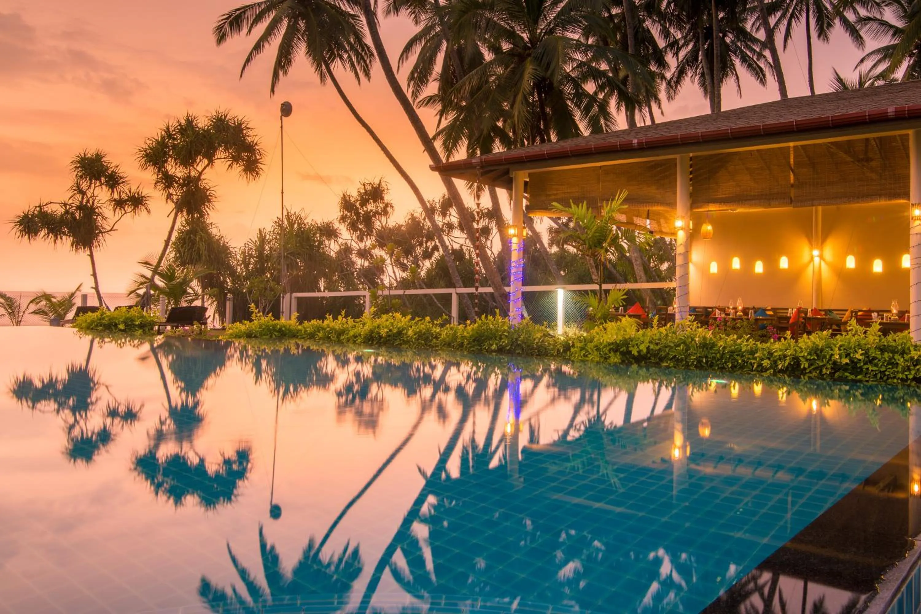 Sunset, Swimming Pool in Lanka Beach Bungalows