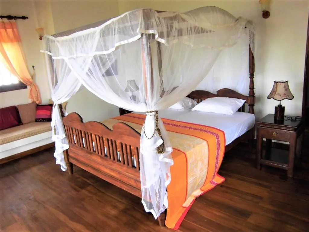 Bed in Lanka Beach Bungalows