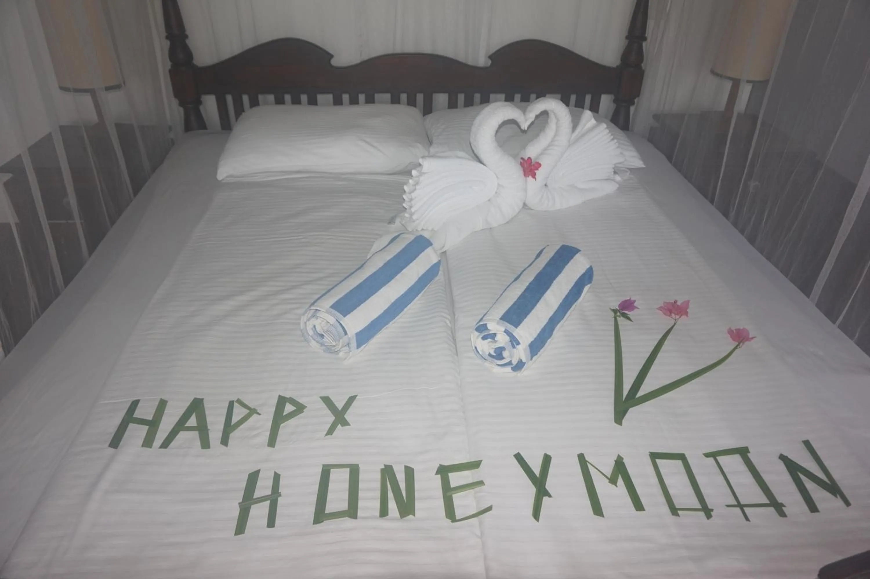 Bed in Lanka Beach Bungalows