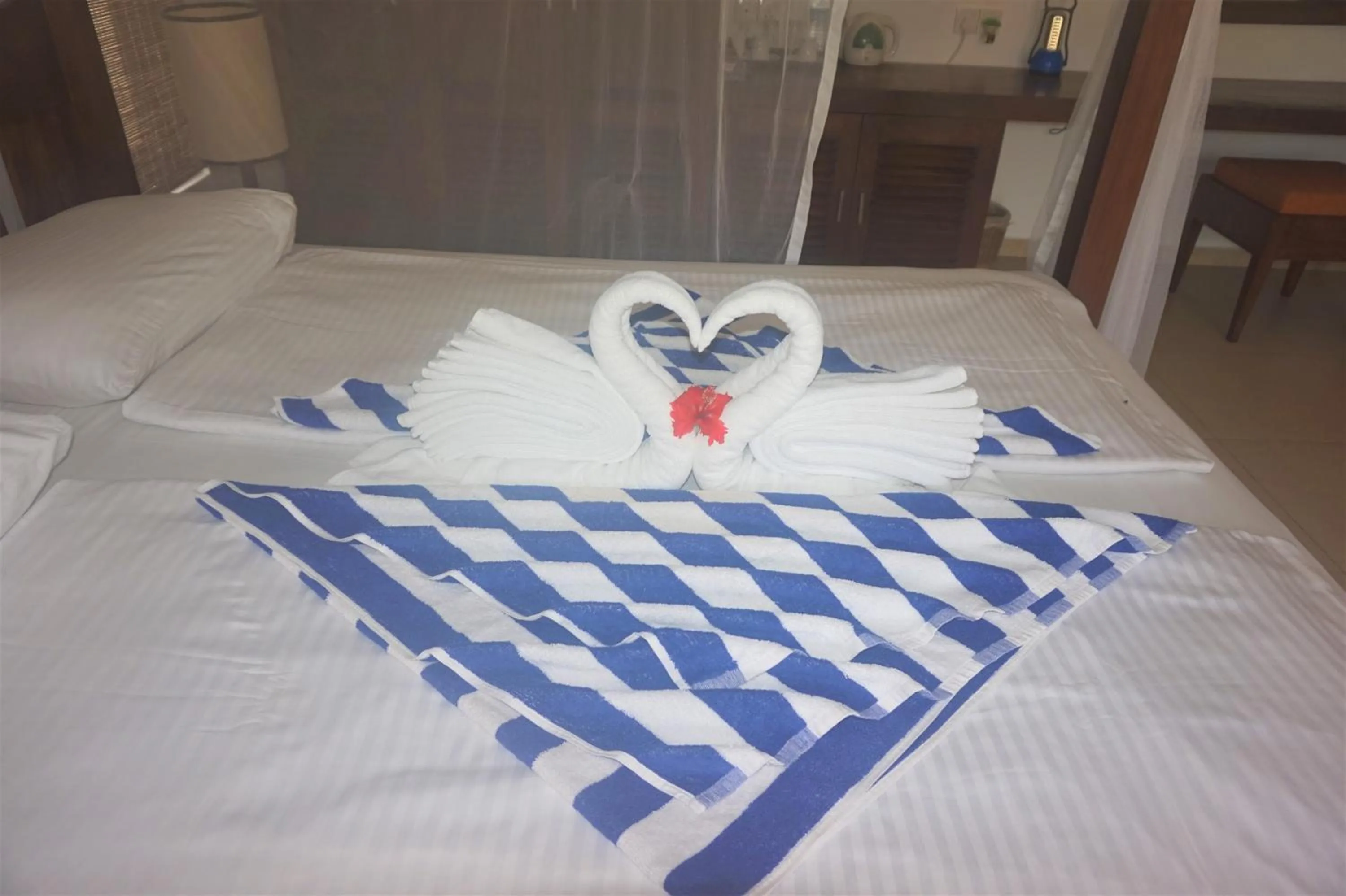 Bed in Lanka Beach Bungalows