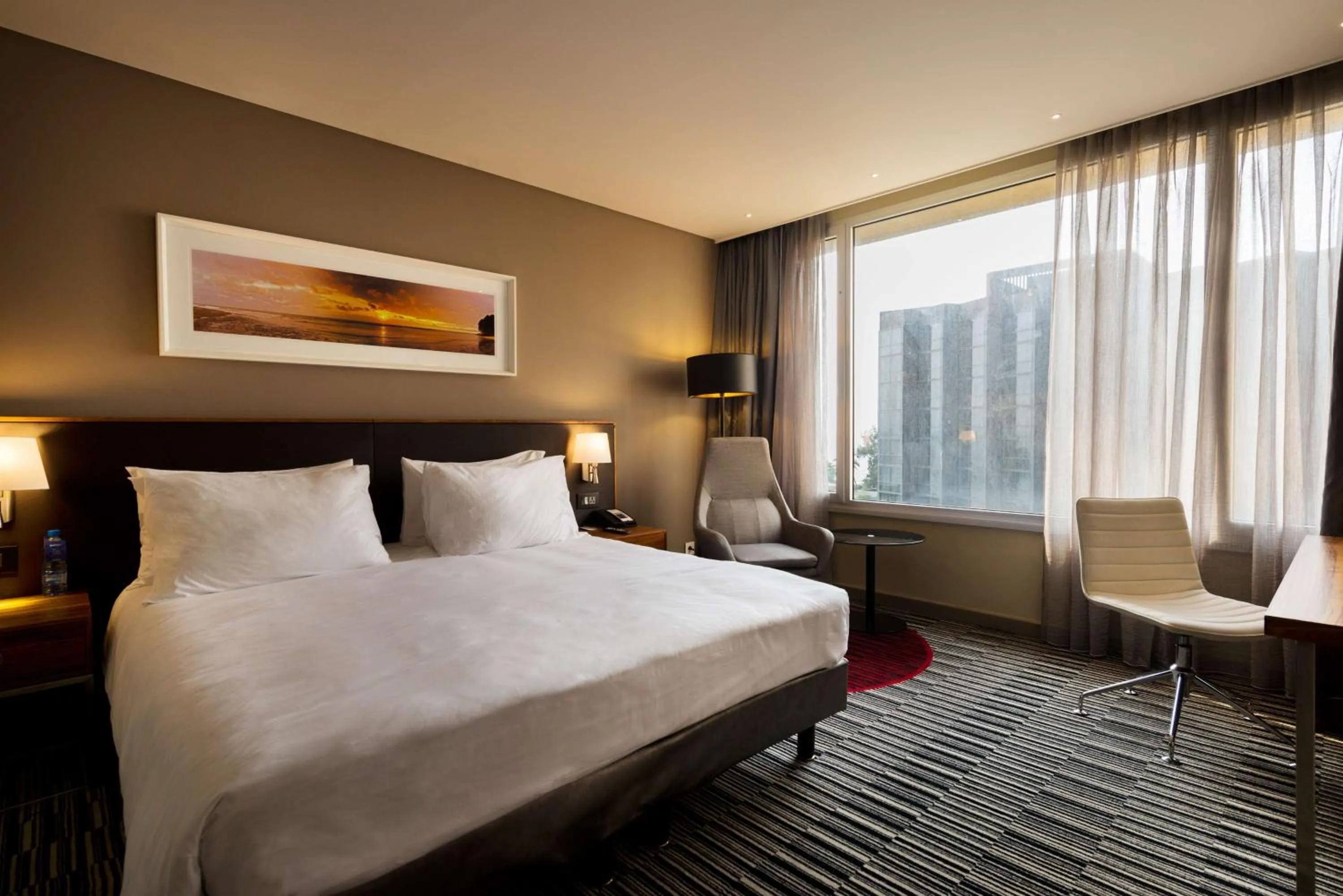 Photo of the whole room, Bed in Radisson Blu Okoume Palace Hotel, Libreville