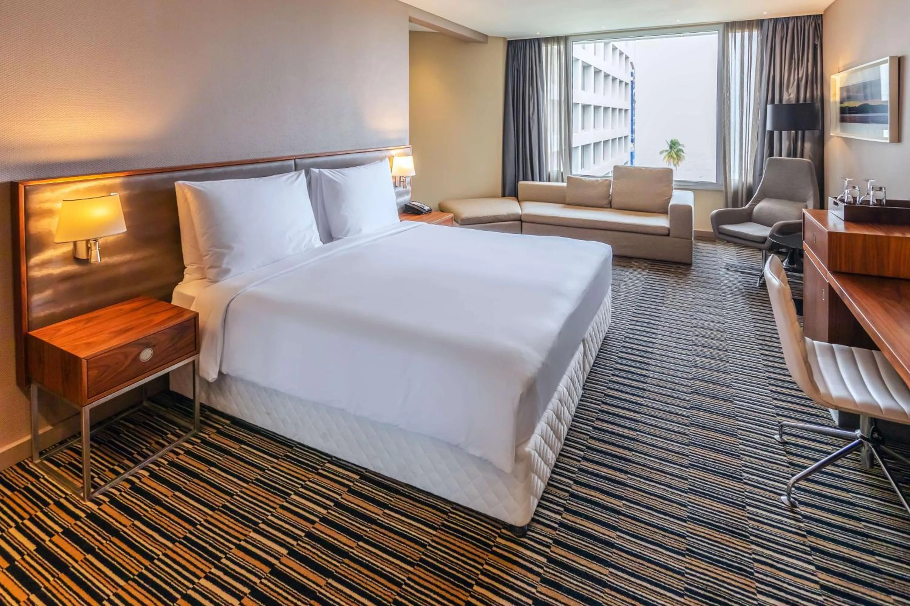 Photo of the whole room, Bed in Radisson Blu Okoume Palace Hotel, Libreville