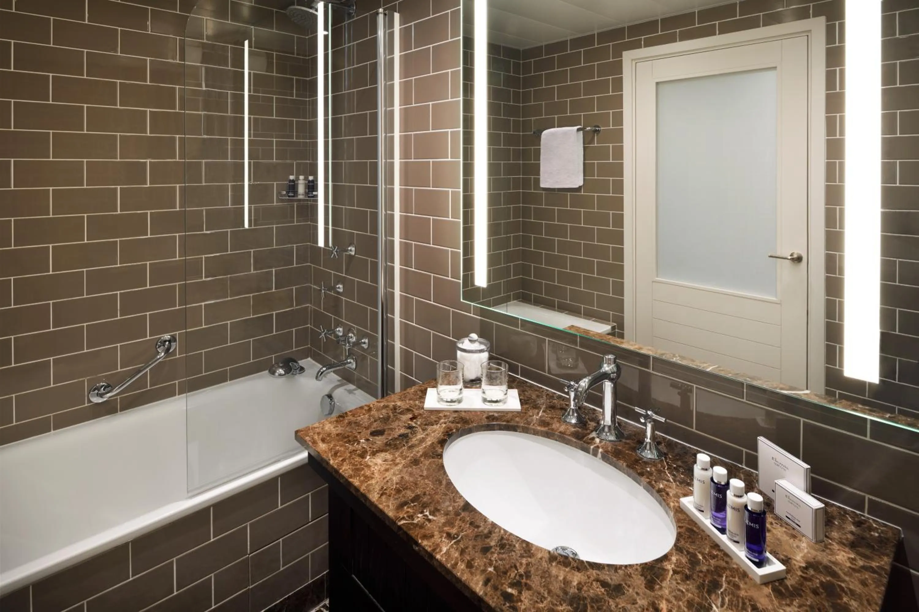 Shower in Columbus Hotel Monte-Carlo, Curio Collection by Hilton