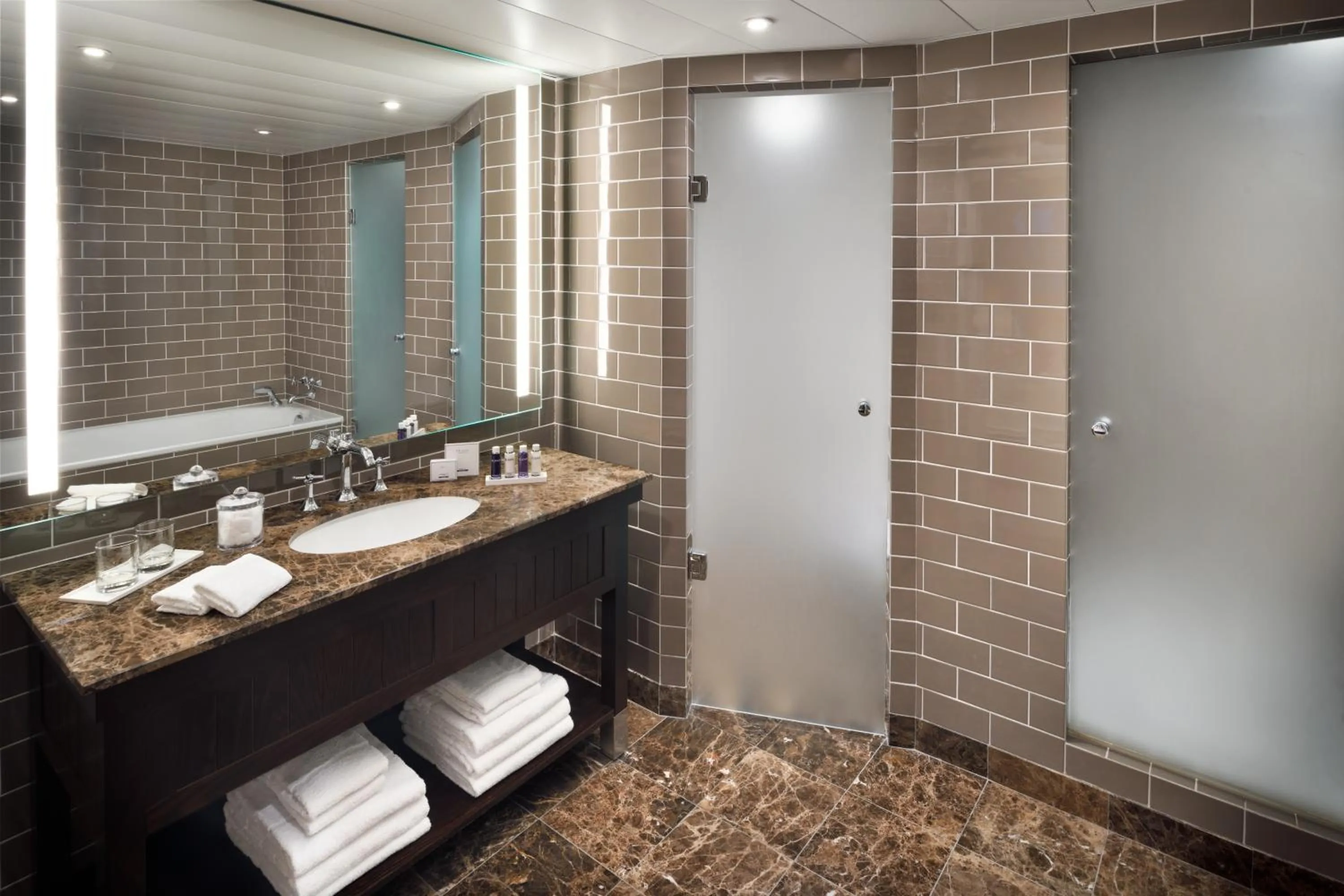 Shower in Columbus Hotel Monte-Carlo, Curio Collection by Hilton