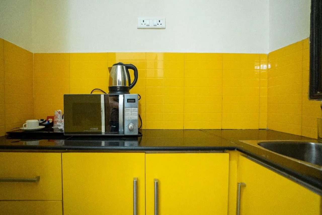 Kitchen or kitchenette in Enkay Residency V Block-Cyber City