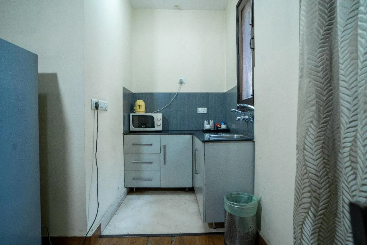 Kitchen or kitchenette in Enkay Residency V Block-Cyber City
