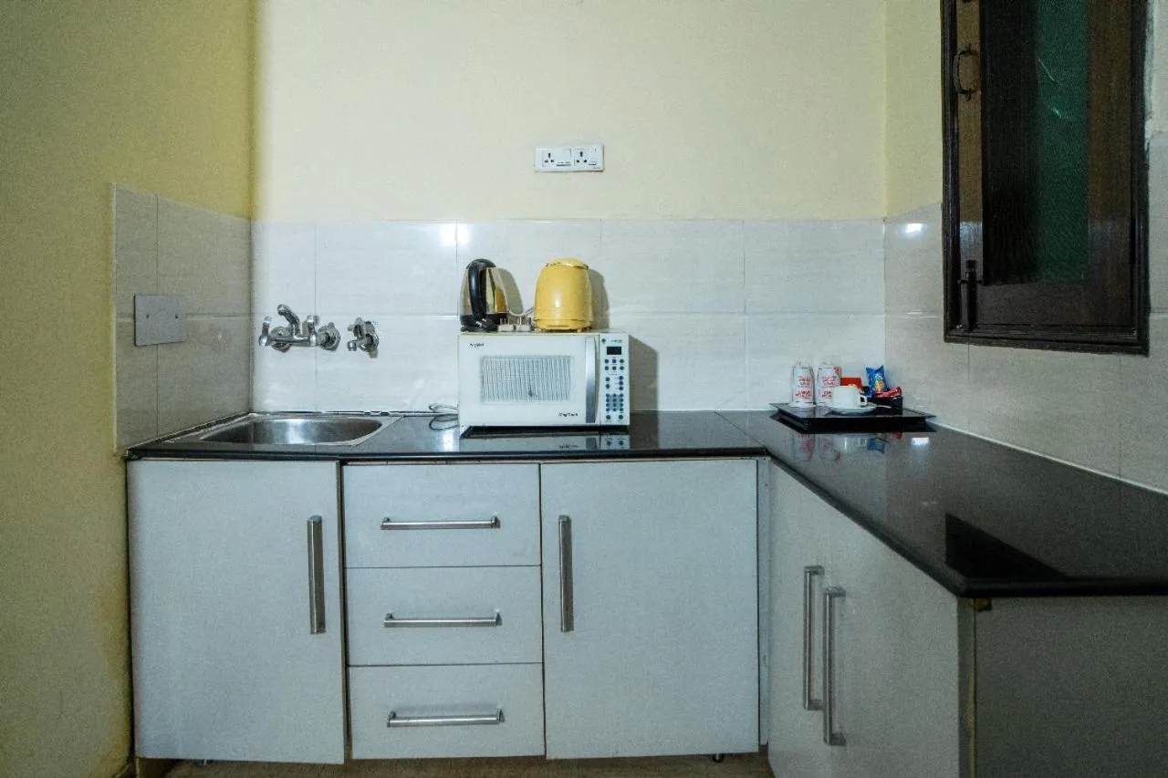 Kitchen or kitchenette in Enkay Residency V Block-Cyber City