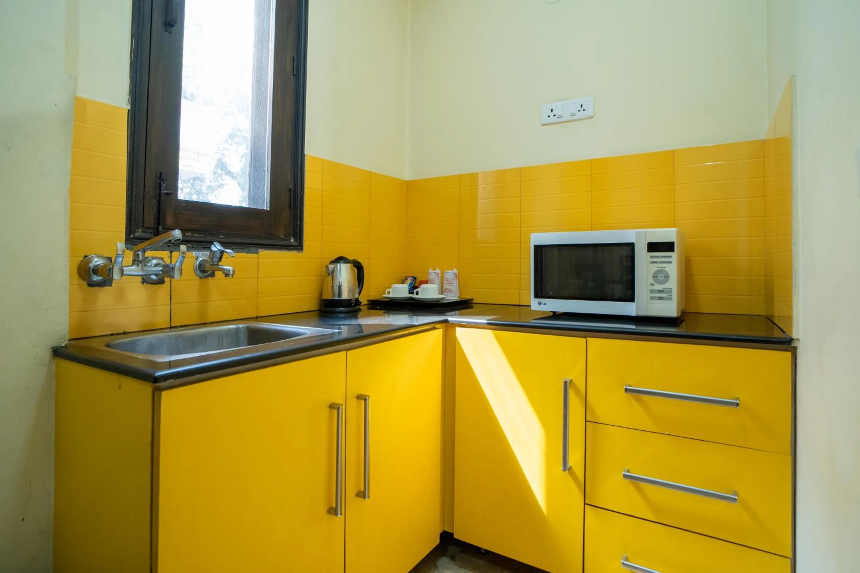 Kitchen or kitchenette in Enkay Residency V Block-Cyber City