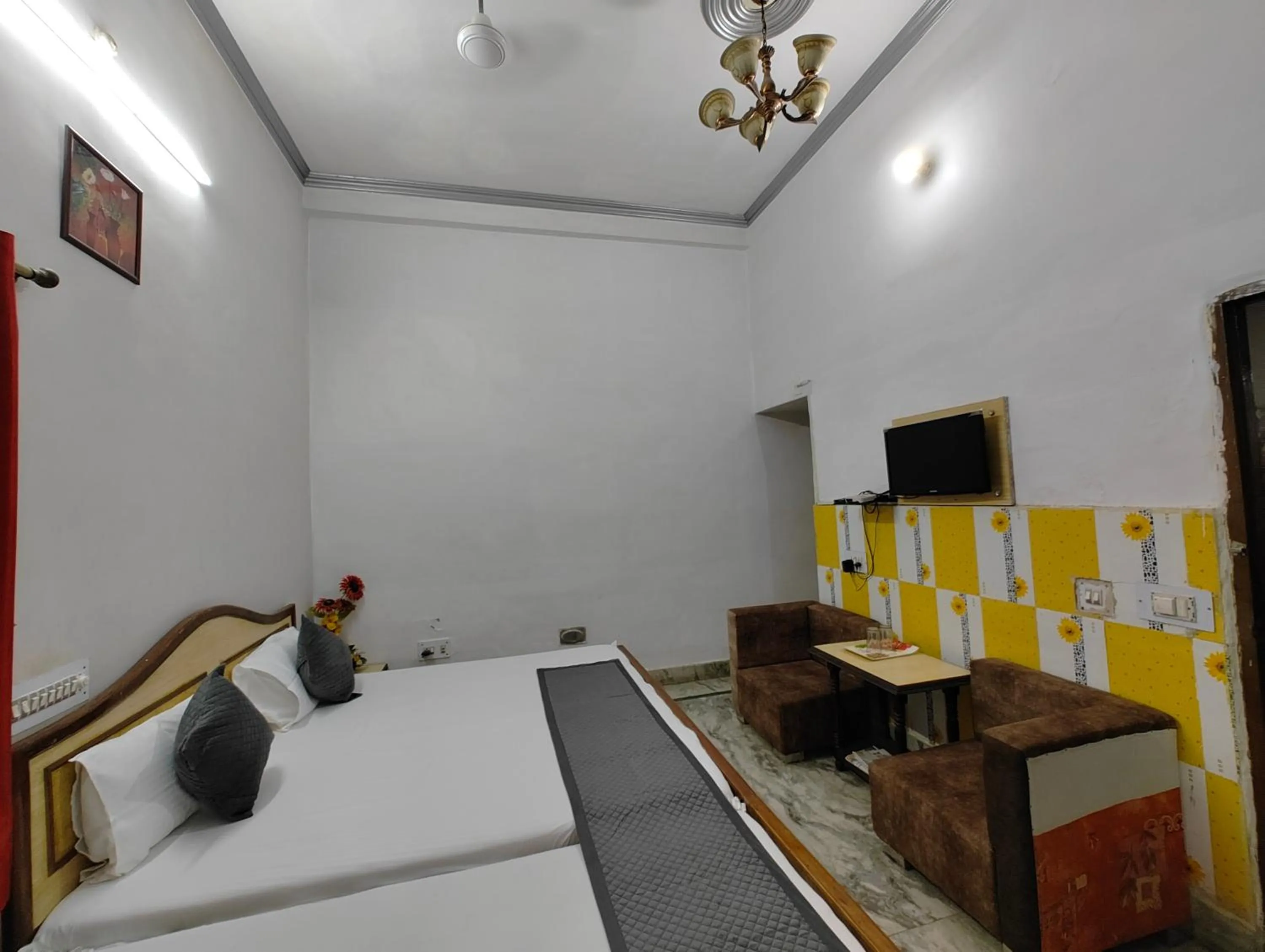 Bed in Hotel Swarajya Palace