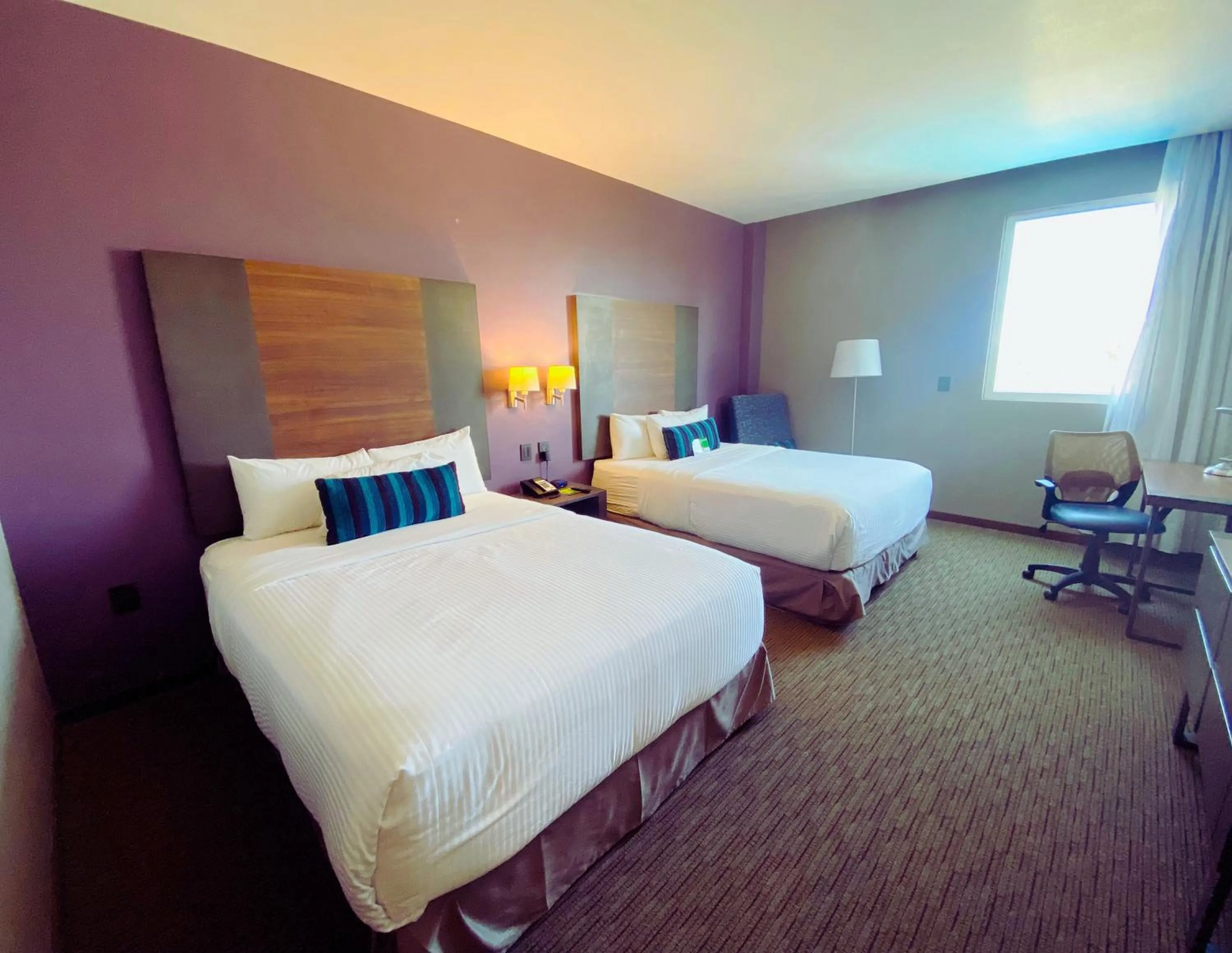 Photo of the whole room, Bed in La Quinta by Wyndham Aguascalientes