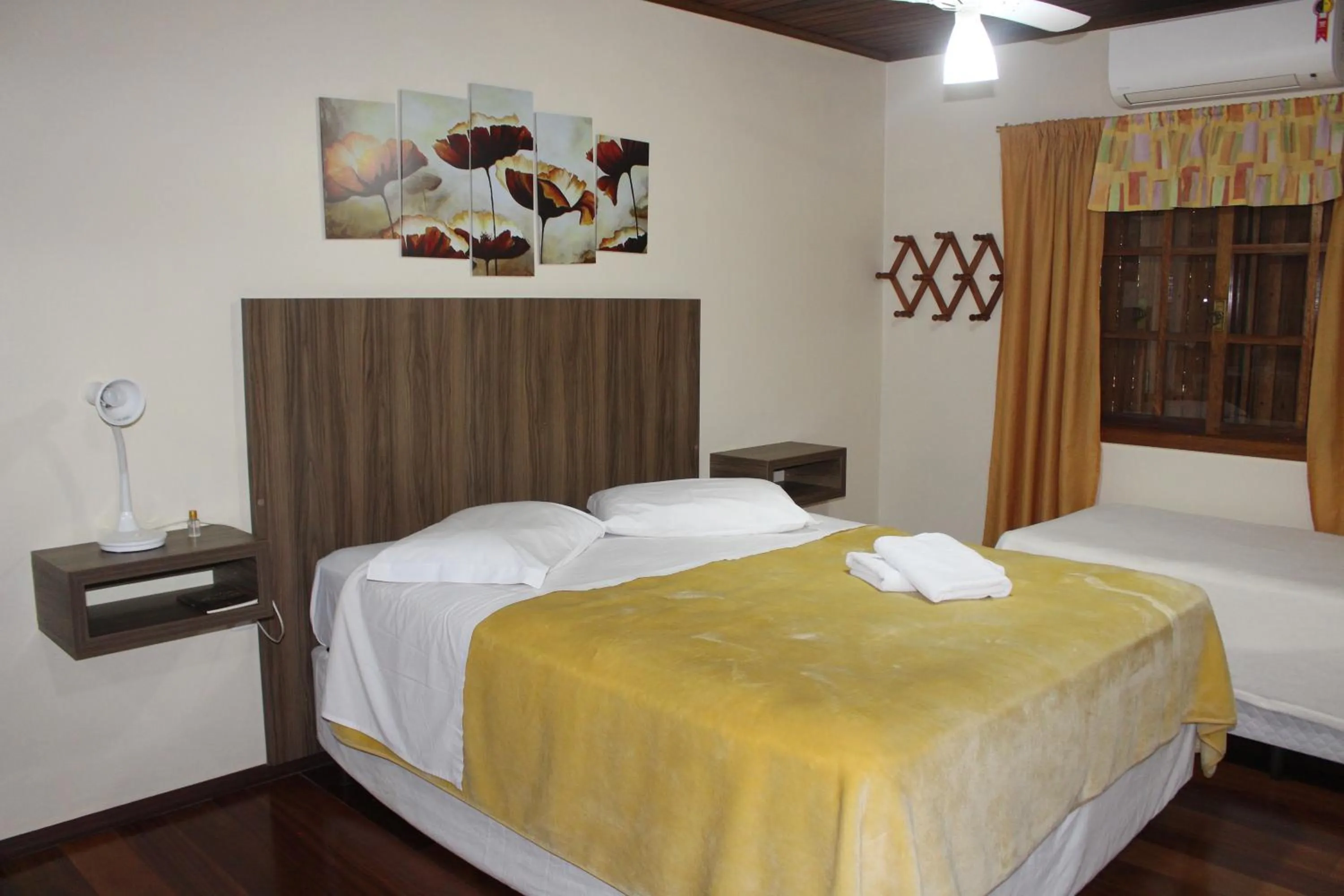 Bedroom in Pousada Floresta Negra