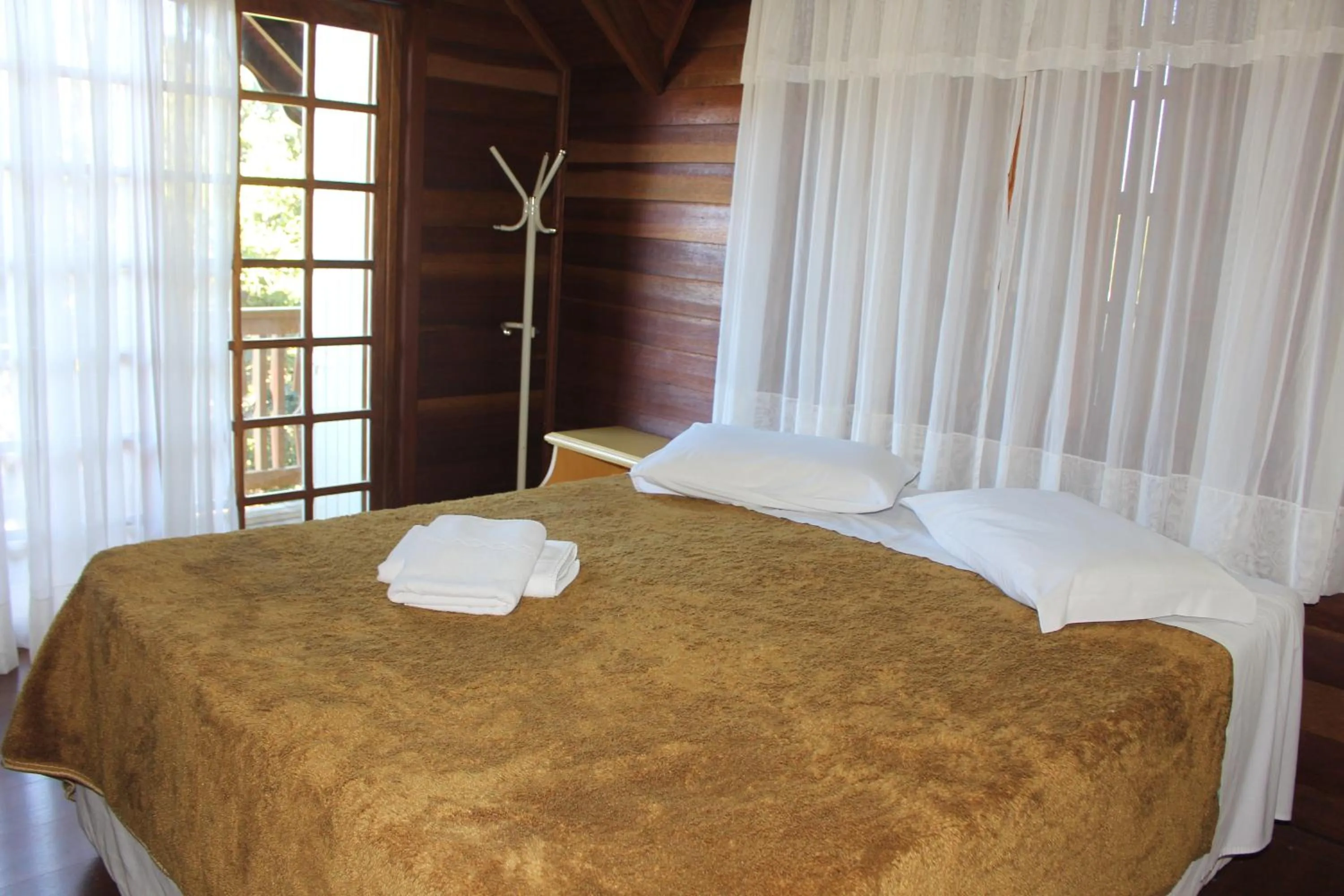 Bedroom in Pousada Floresta Negra