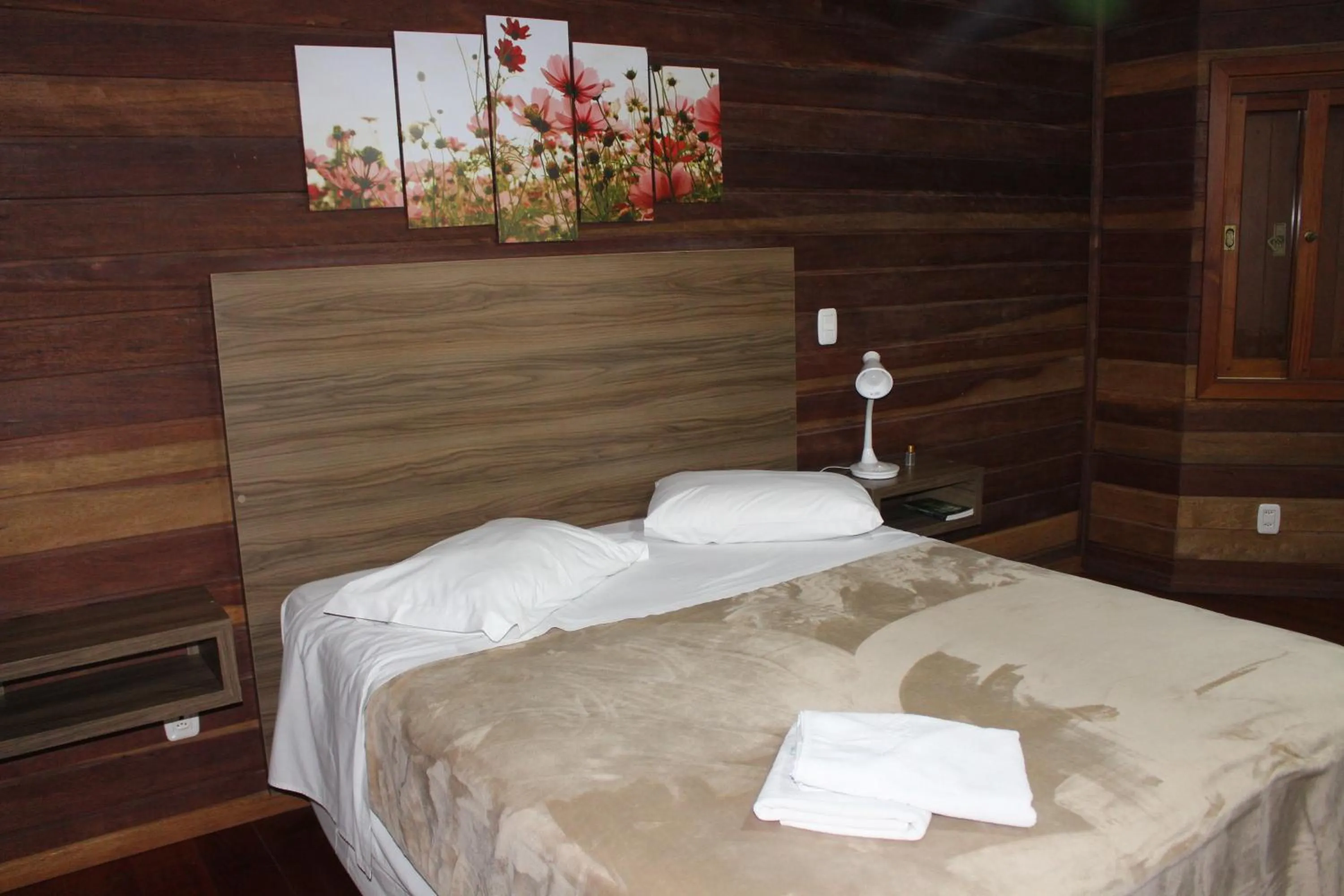 Bedroom in Pousada Floresta Negra