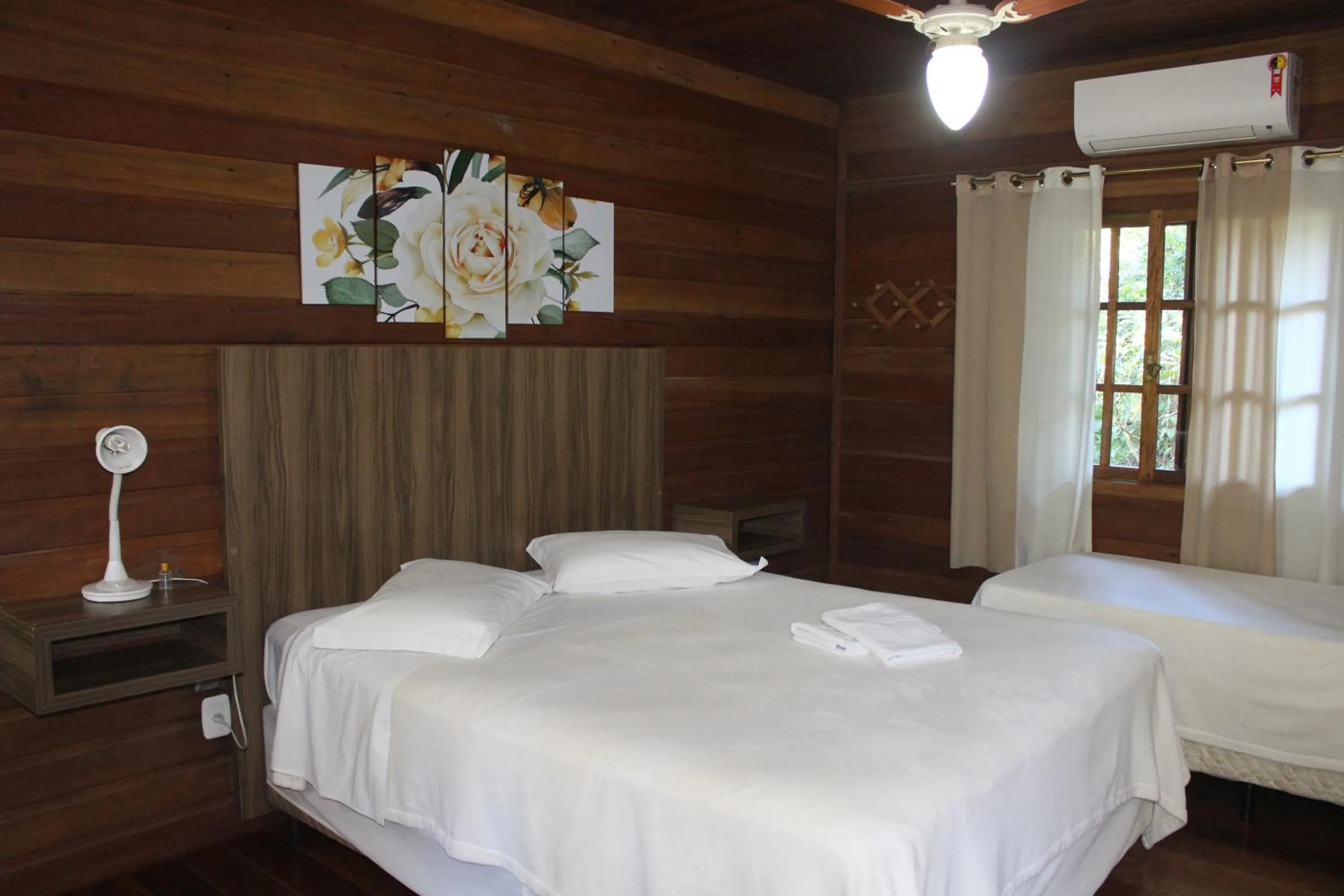 Bedroom in Pousada Floresta Negra