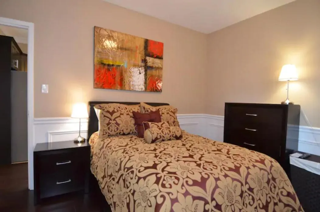 Bed in The SoMa Furnished Residences