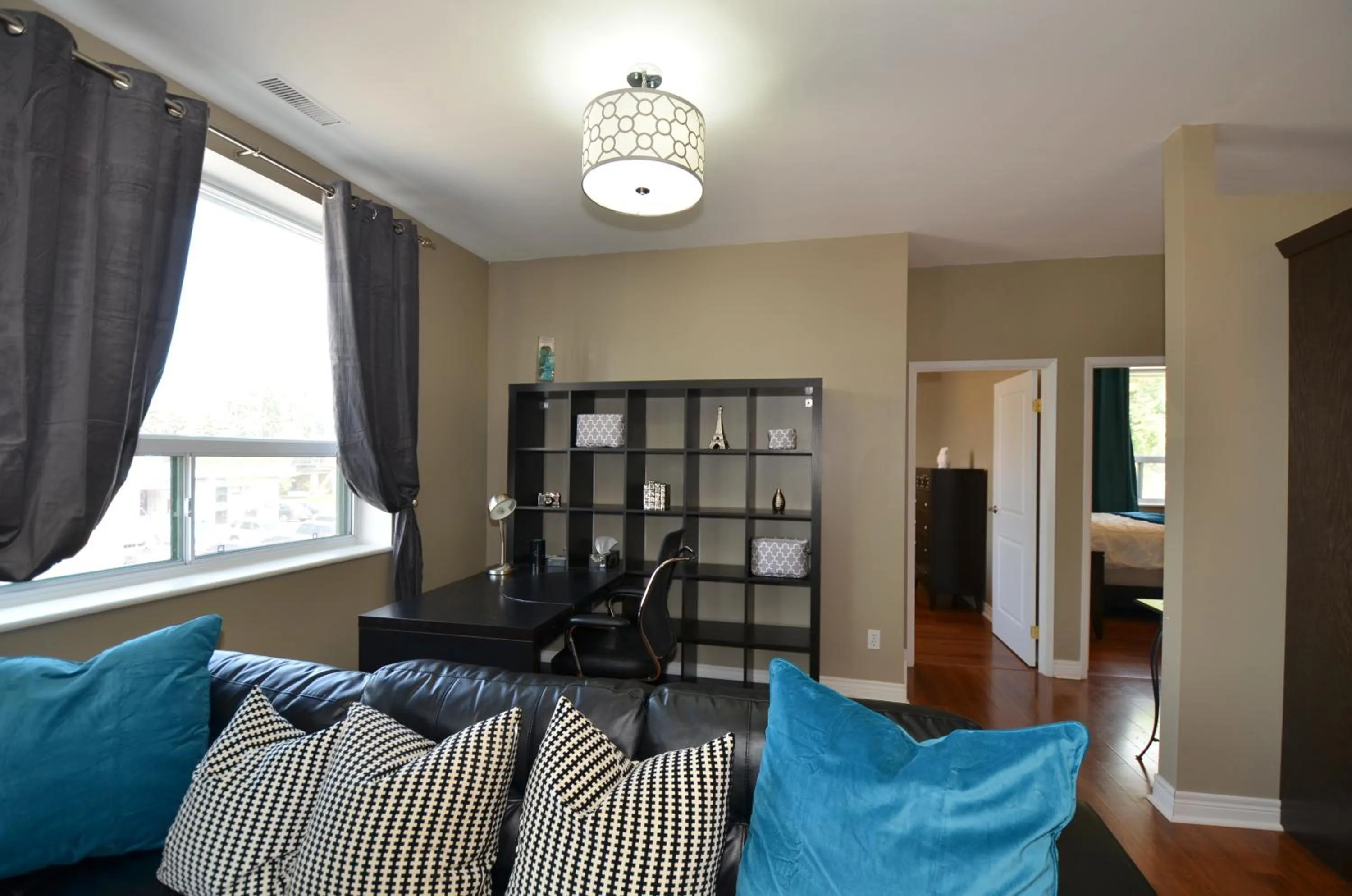 Living room, Bed in The SoMa Furnished Residences