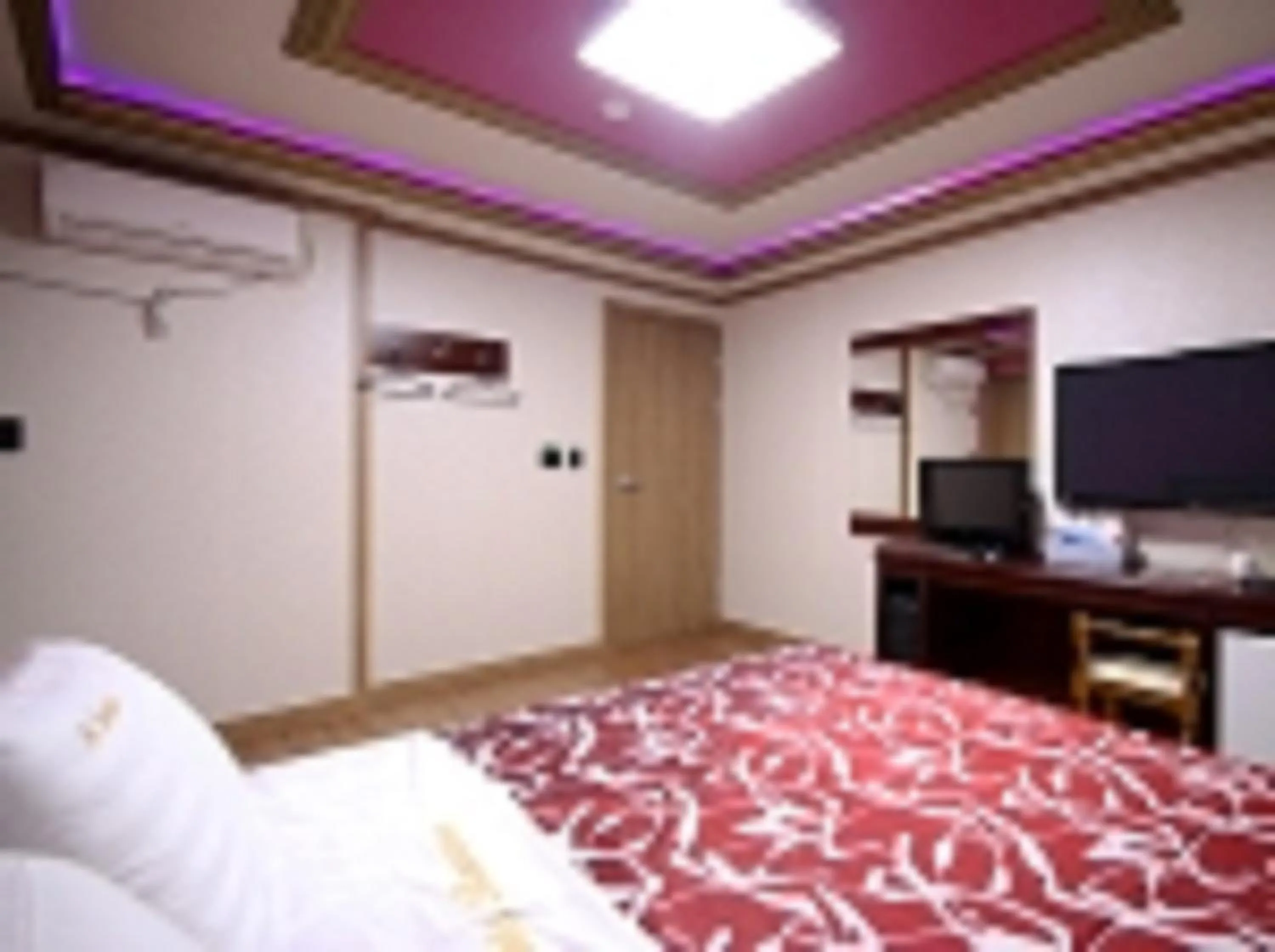 TV/Entertainment Center in GuangJu Hotel Banana