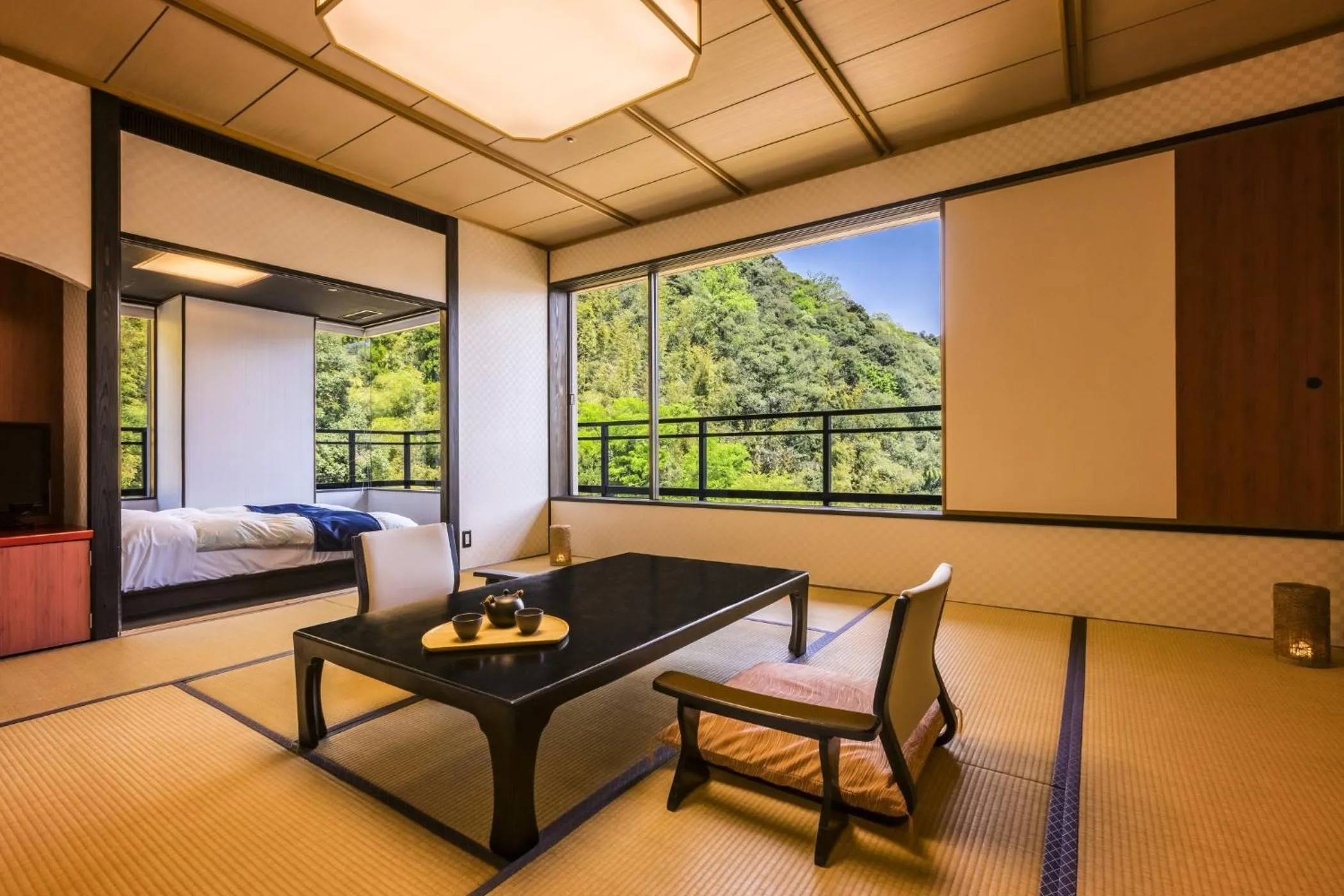 Photo of the whole room, Bed in Ooedo Onsen Monogatari Premium Saiki Bekkan