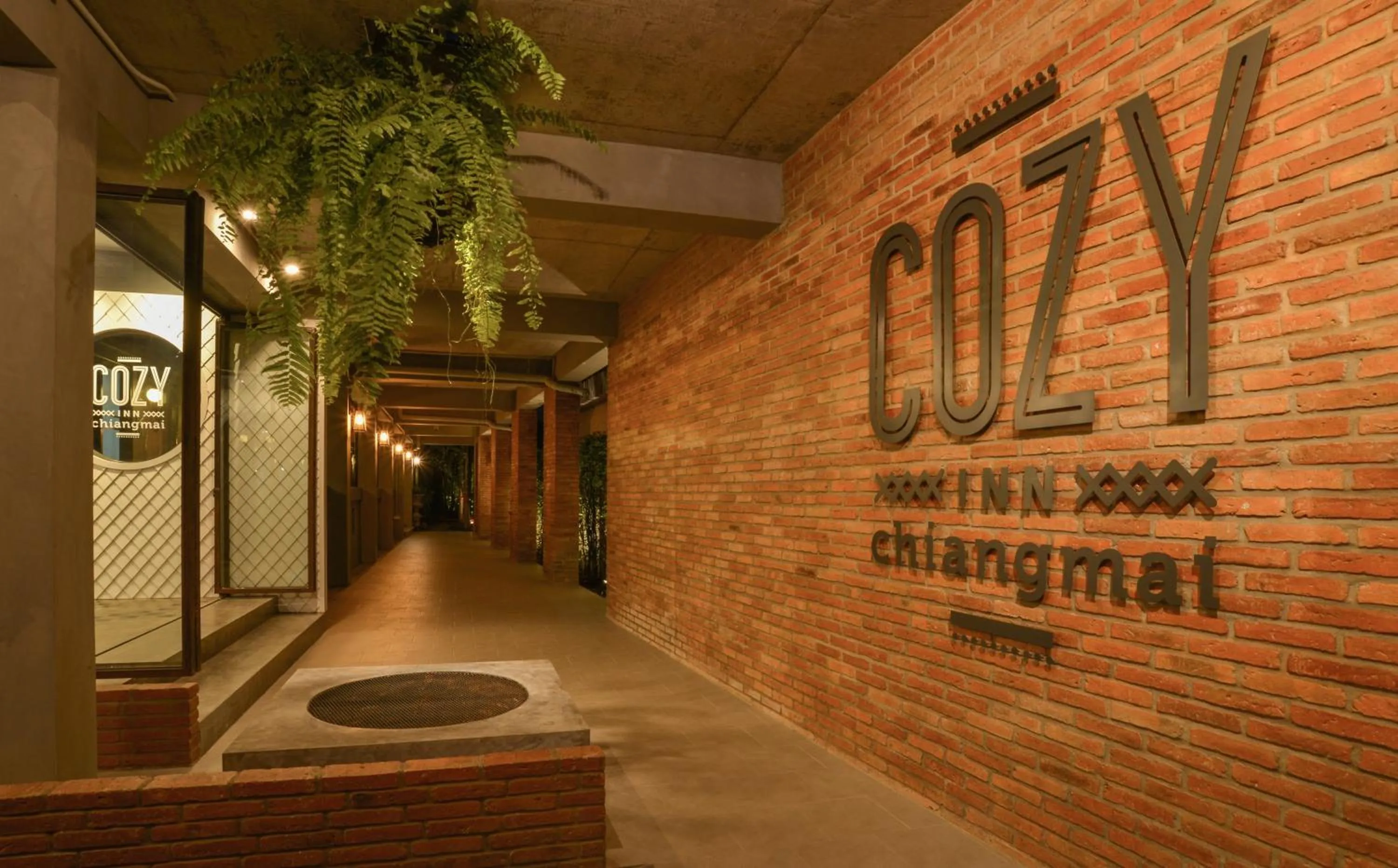 Property building in Cozy Inn Chiang Mai