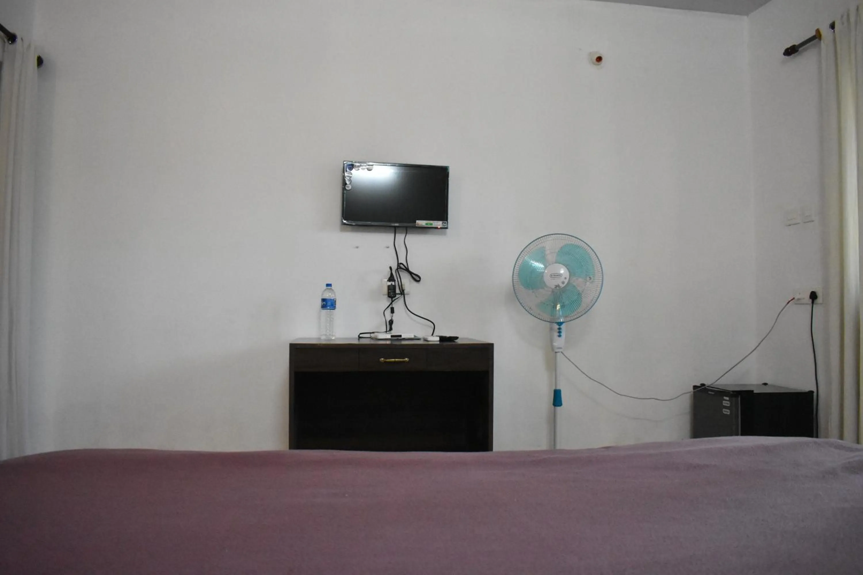 Bed in Club Palolem Resort