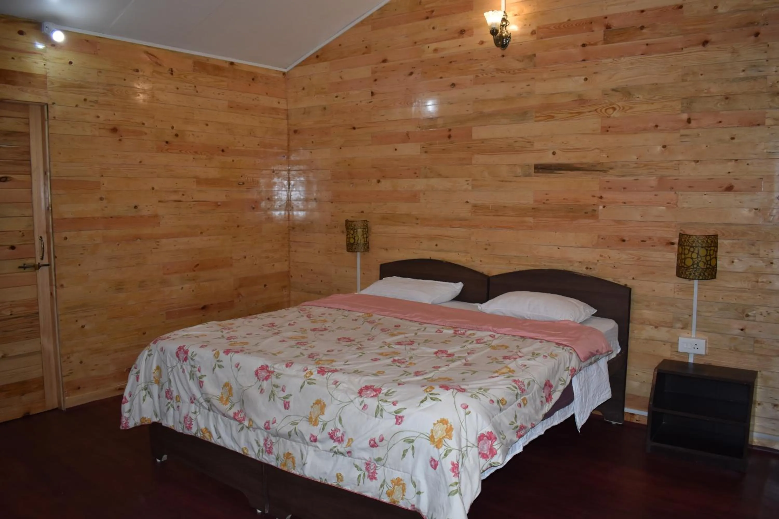 Bed in Club Palolem Resort