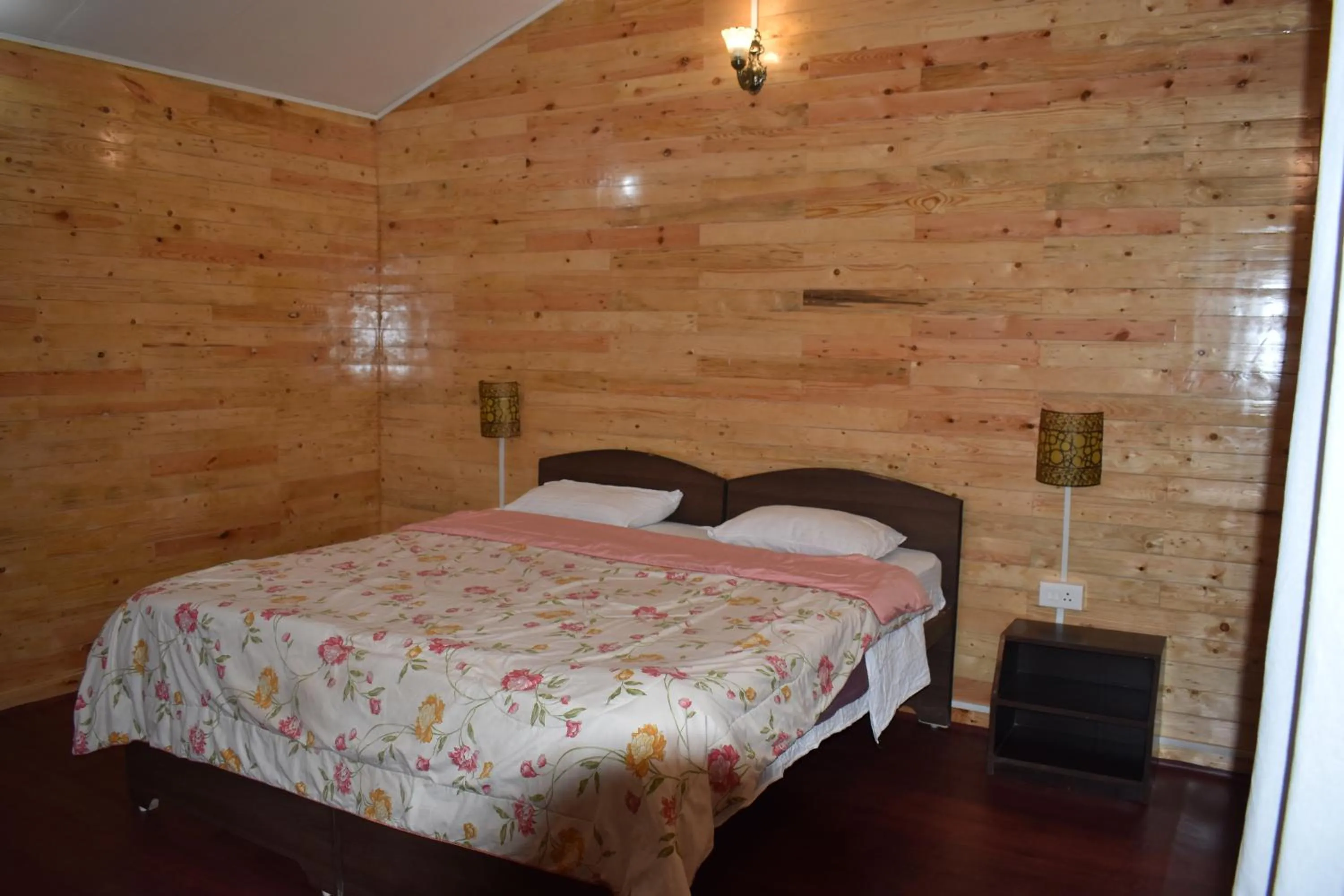 Bed in Club Palolem Resort