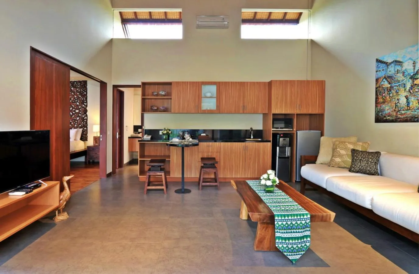 Communal lounge/ TV room, Bed in Desa Di Bali Villas
