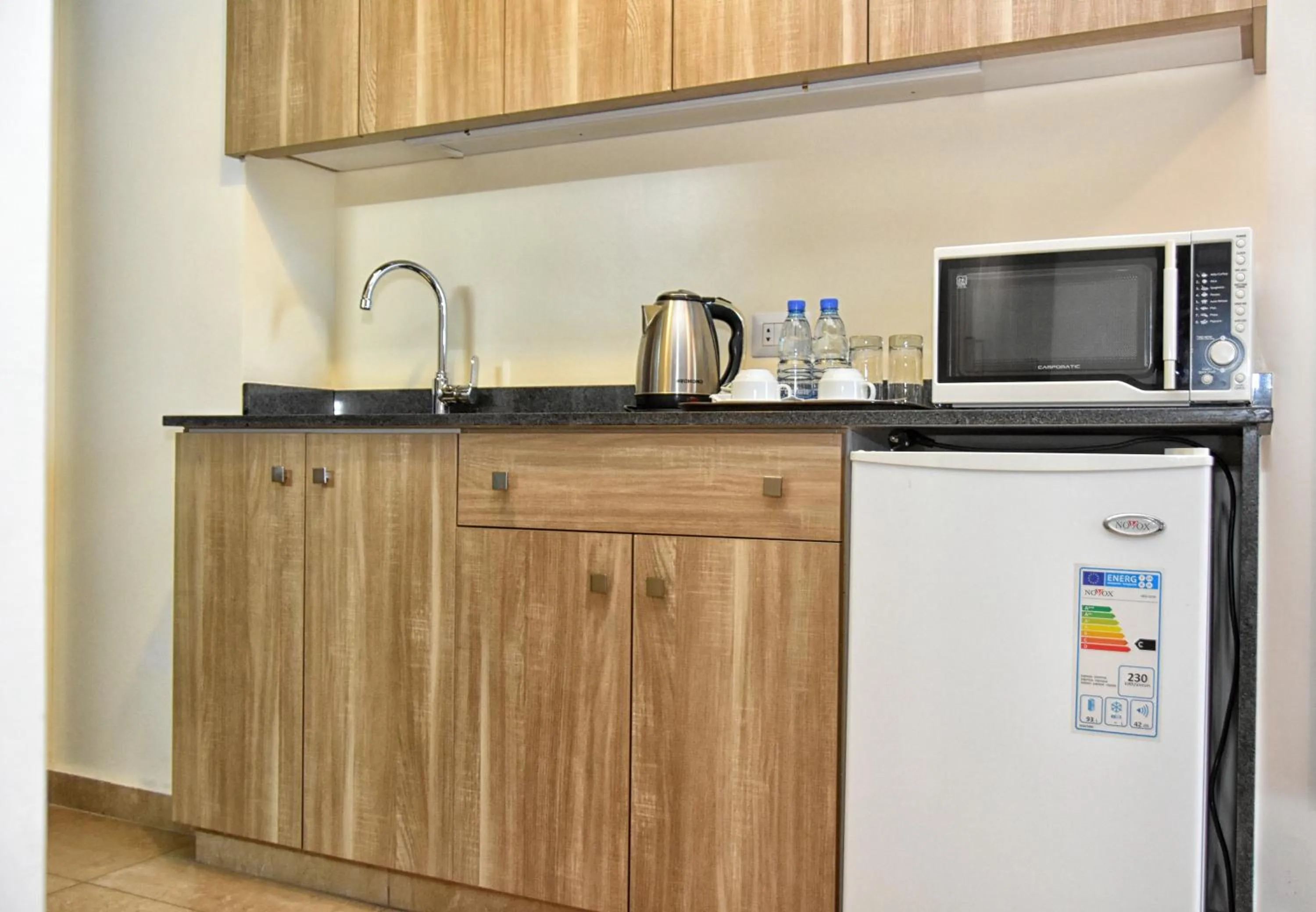 Kitchen or kitchenette in Byblostar Hotel