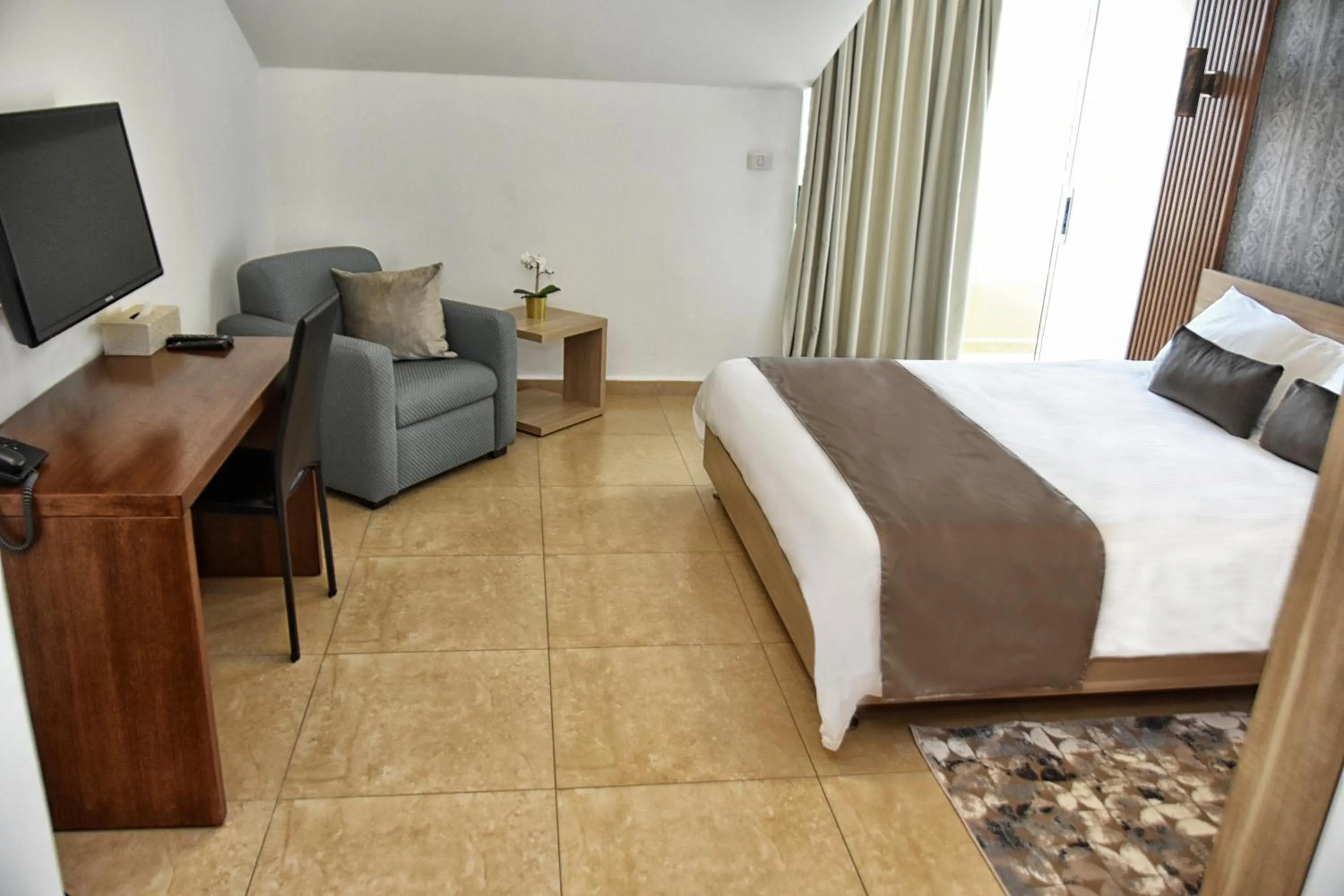 Bed in Byblostar Hotel