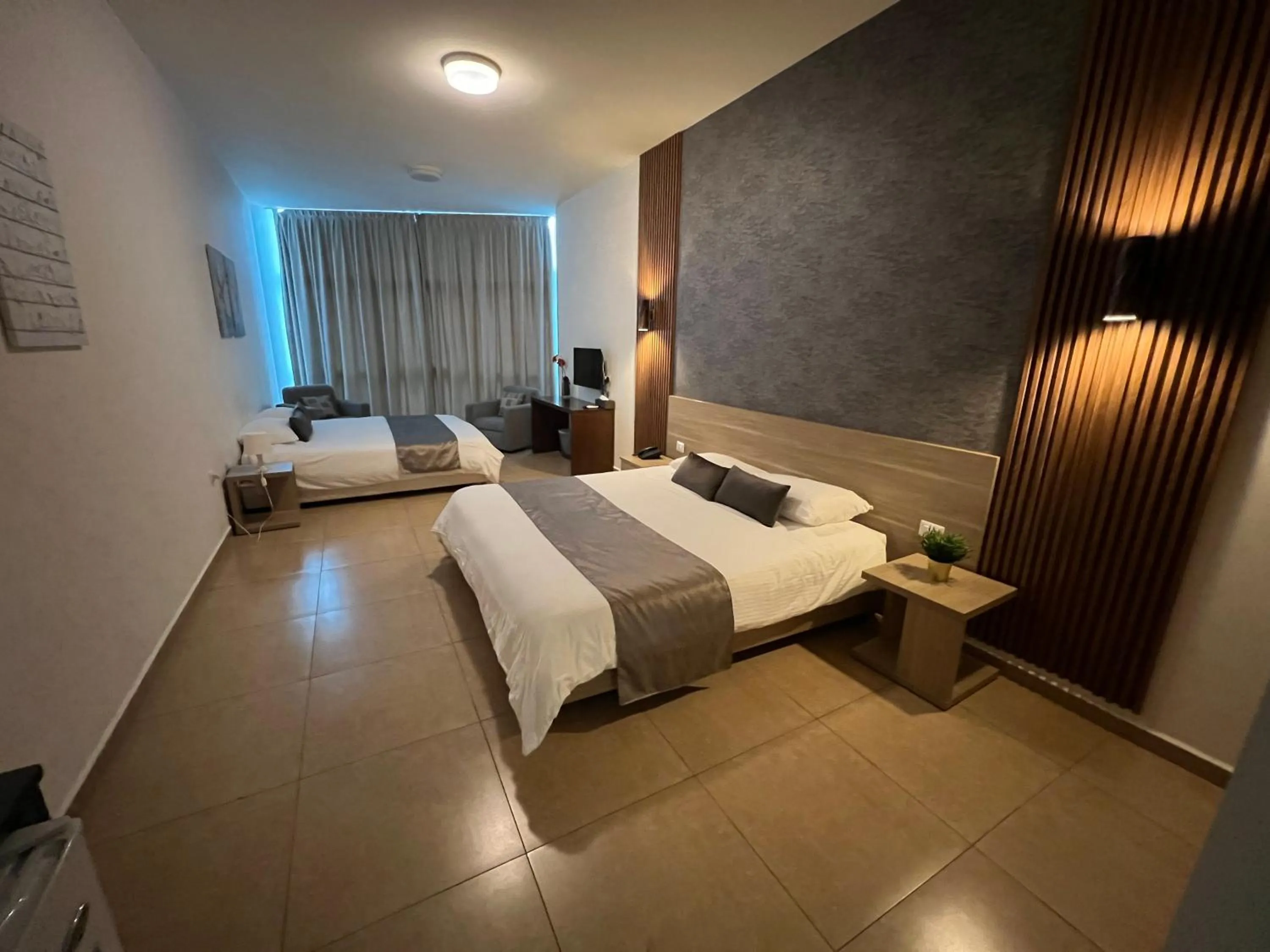 Bed in Byblostar Hotel