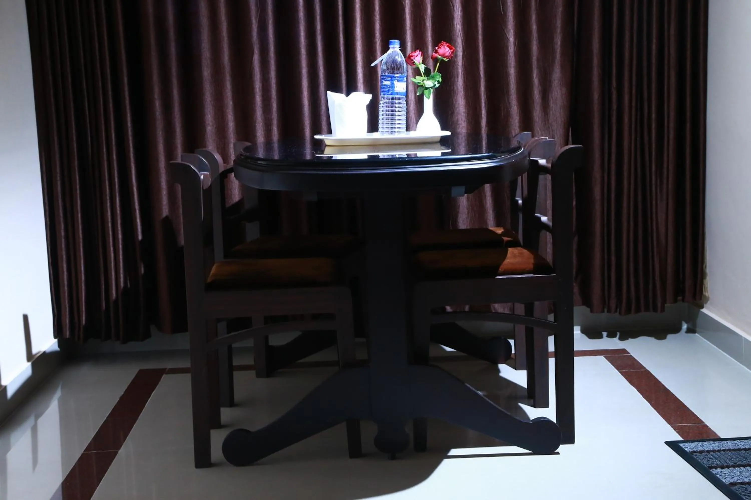 Dining area in Orison Residency Hotel