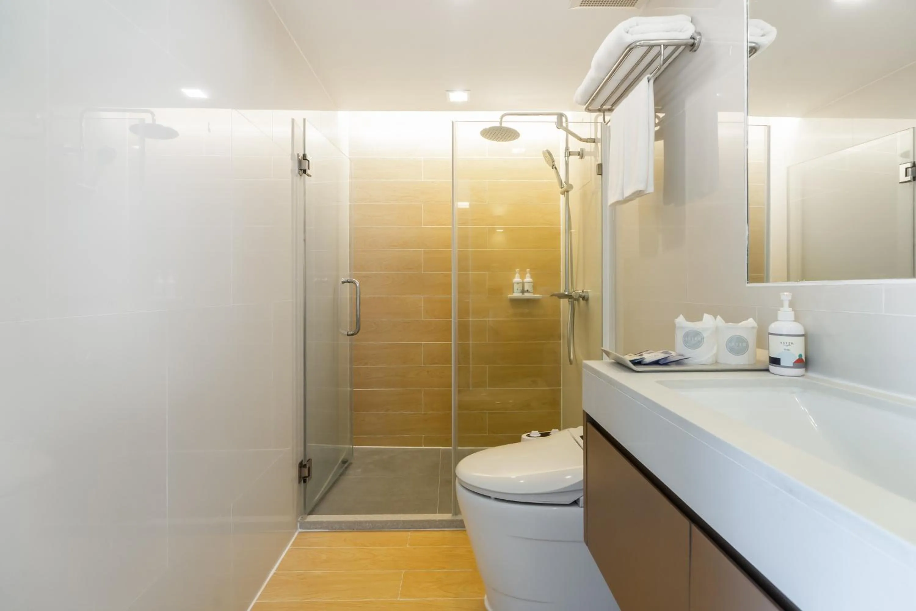 Shower in Aster Hotel and Residence by At Mind