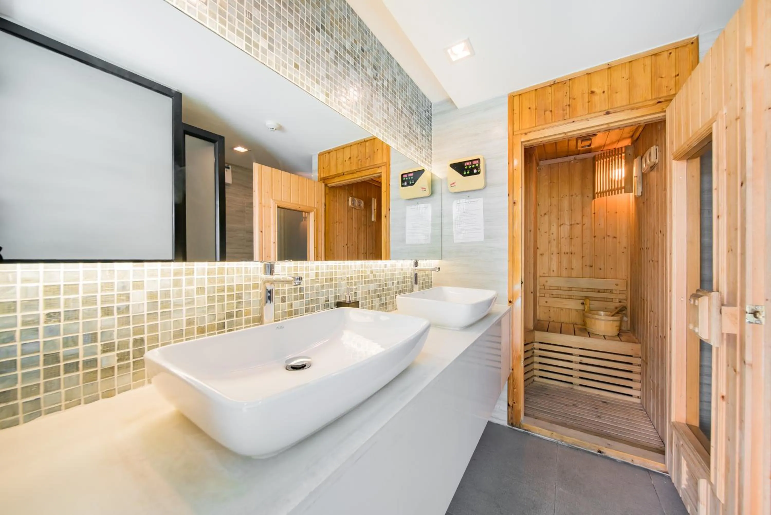 Sauna in Aster Hotel and Residence by At Mind