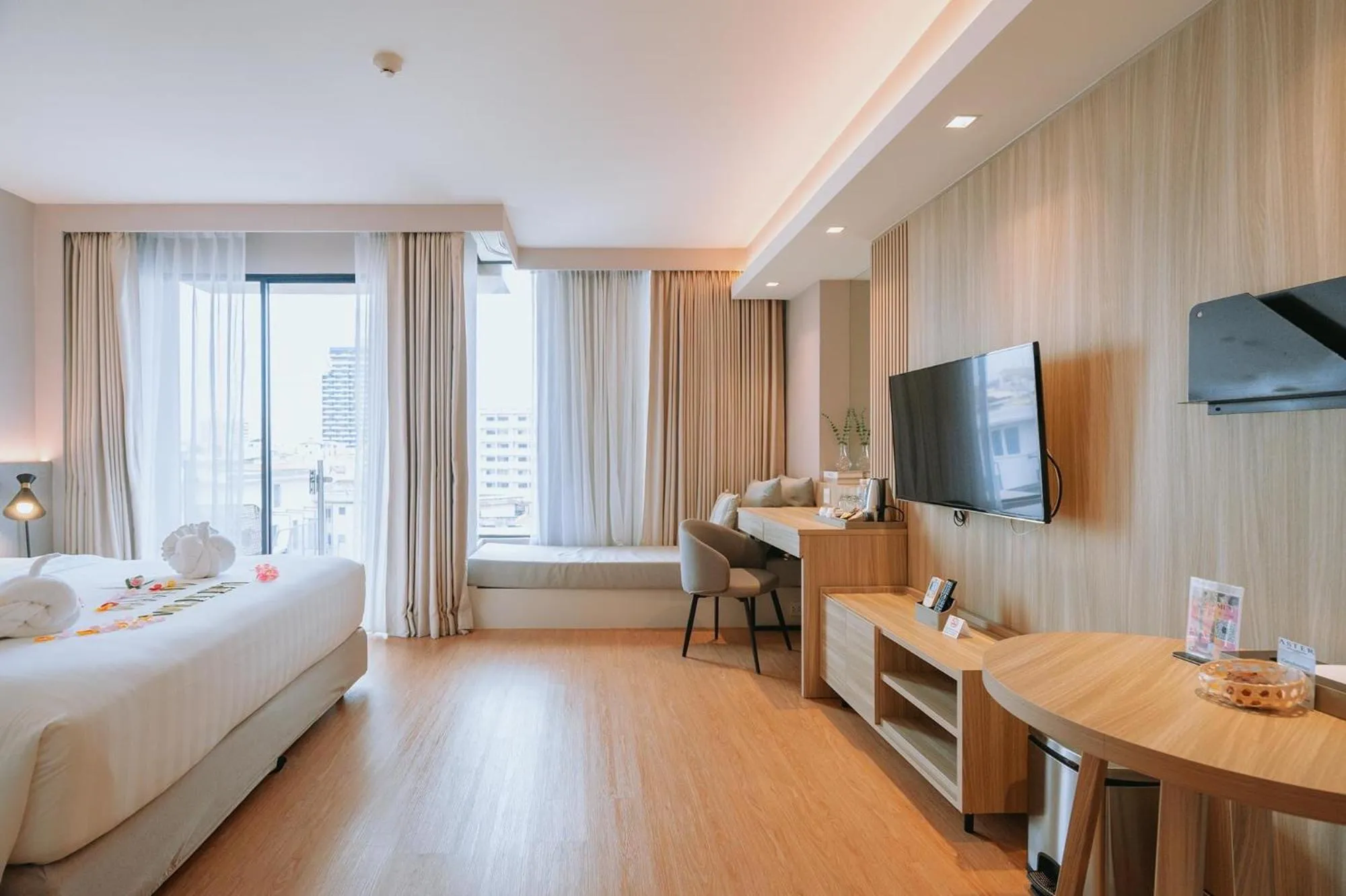 Bedroom, Bed in Aster Hotel and Residence by At Mind