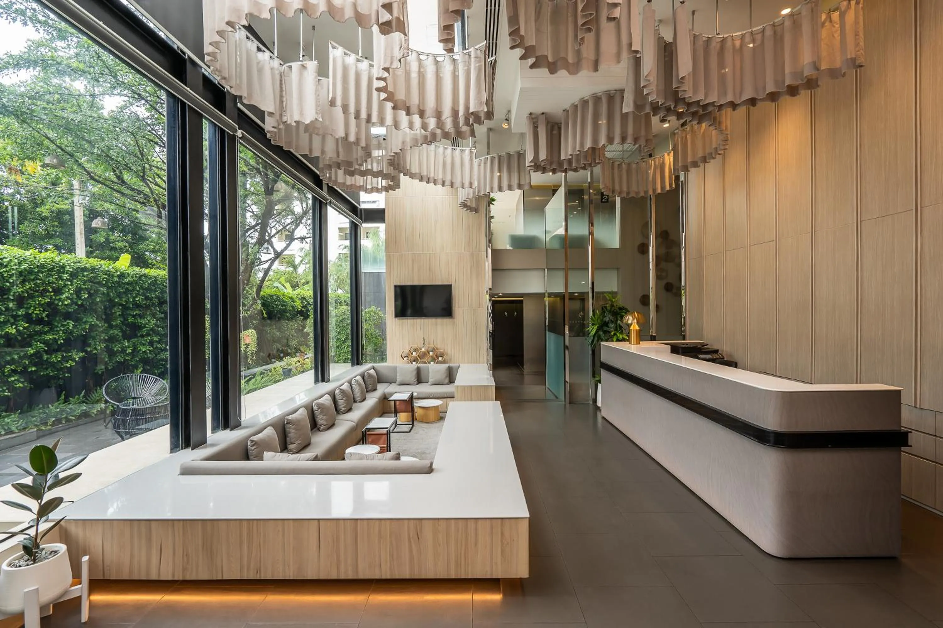 Lobby or reception in Aster Hotel and Residence by At Mind