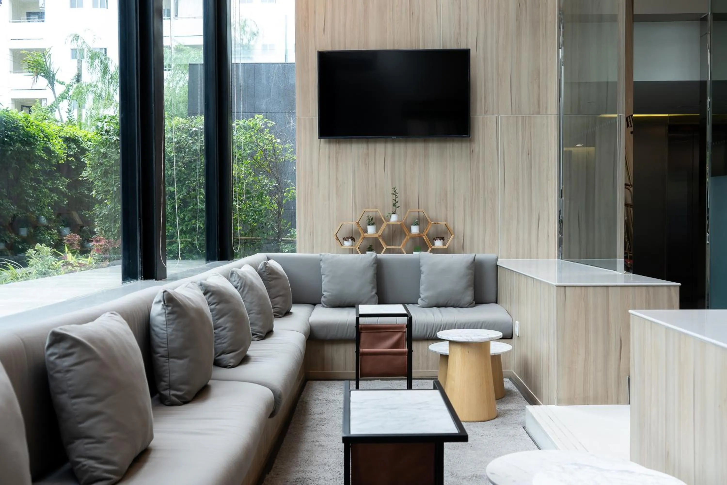 Lobby or reception in Aster Hotel and Residence by At Mind