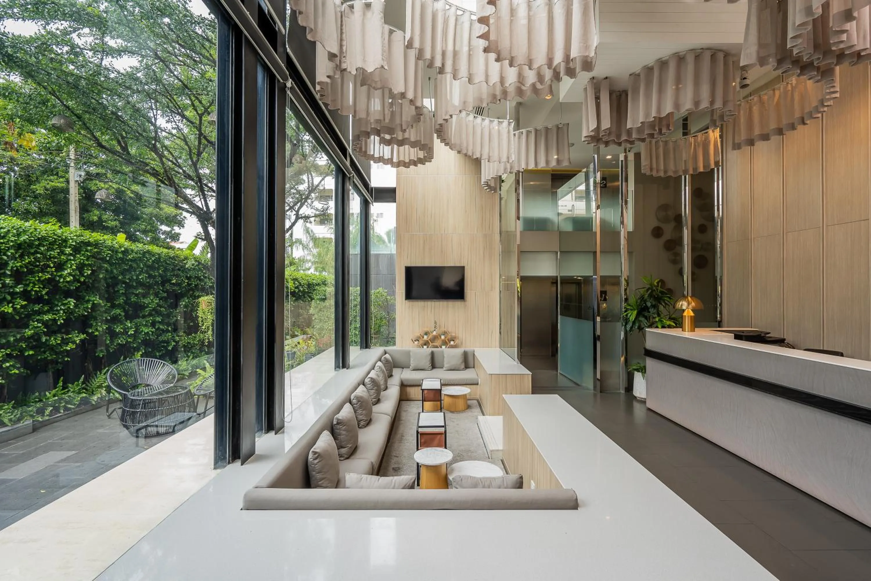 Lobby or reception in Aster Hotel and Residence by At Mind