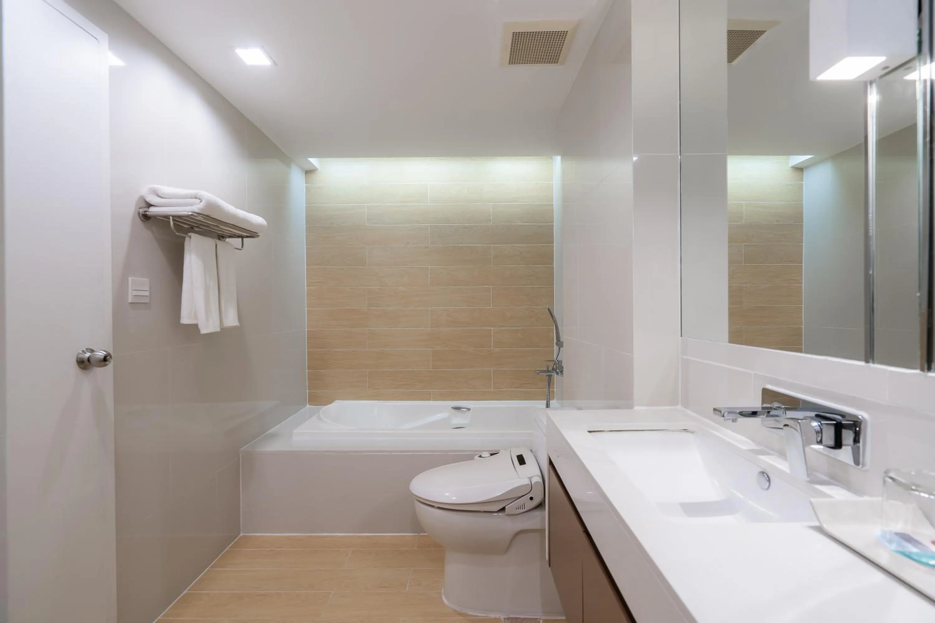 Toilet in Aster Hotel and Residence by At Mind