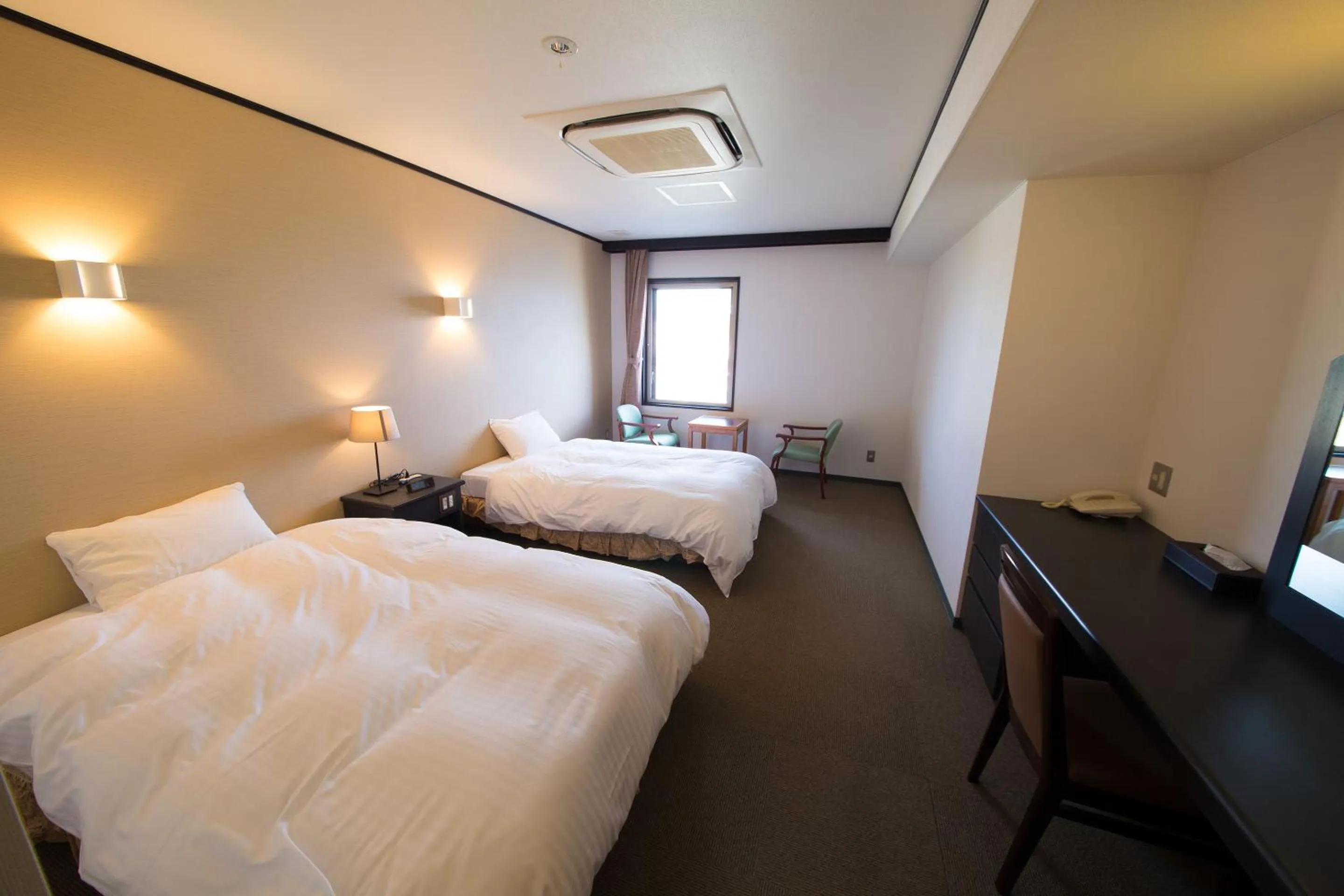 Photo of the whole room, Bed in Seaside Hotel Taimaru Kaigetsu